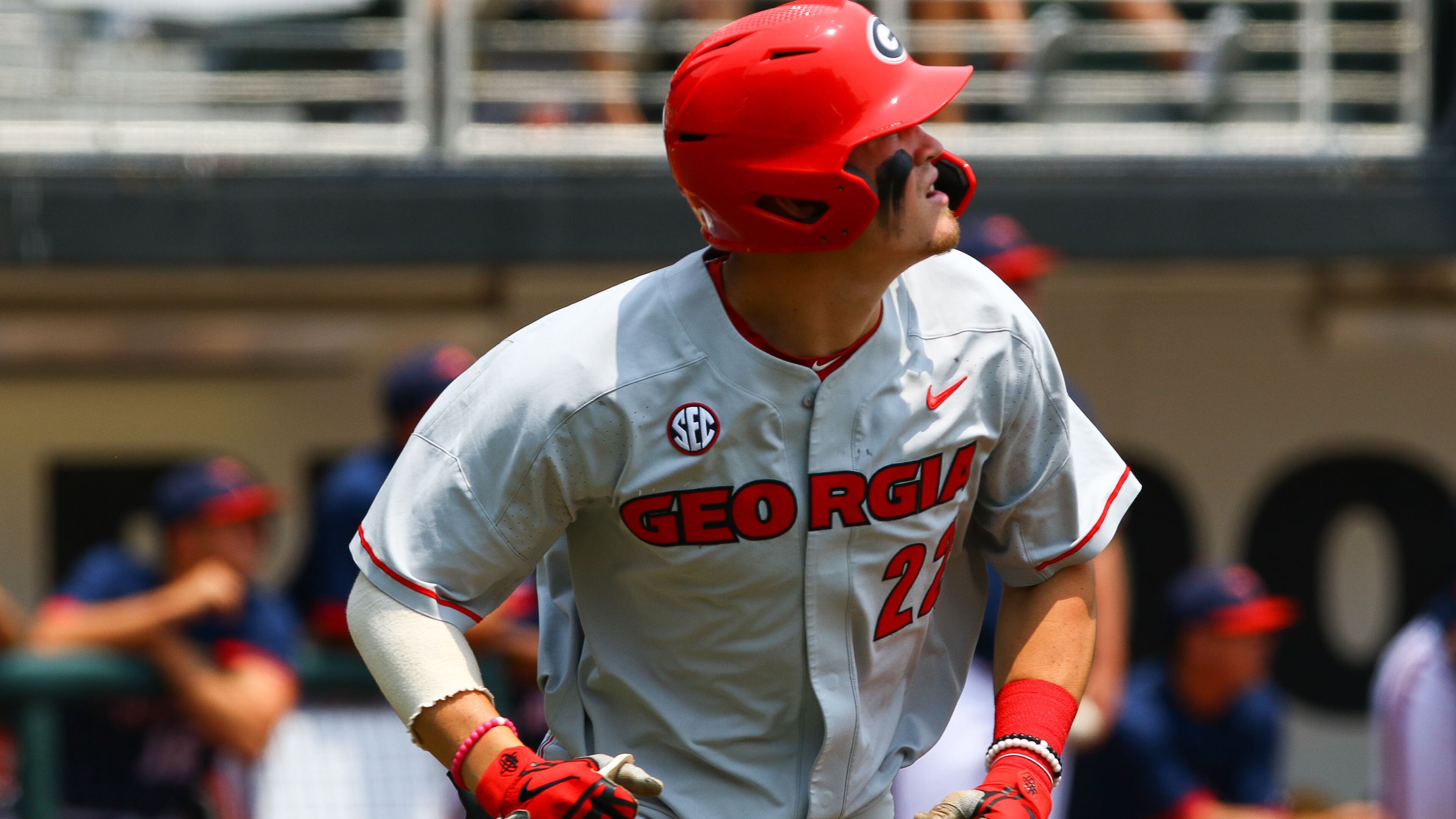 Georgia infielder Aaron Schunk (22) watches his ball fly over the wall against Florida Atlantic Sunday, June 2, 2019, at Foley Field in Athens.