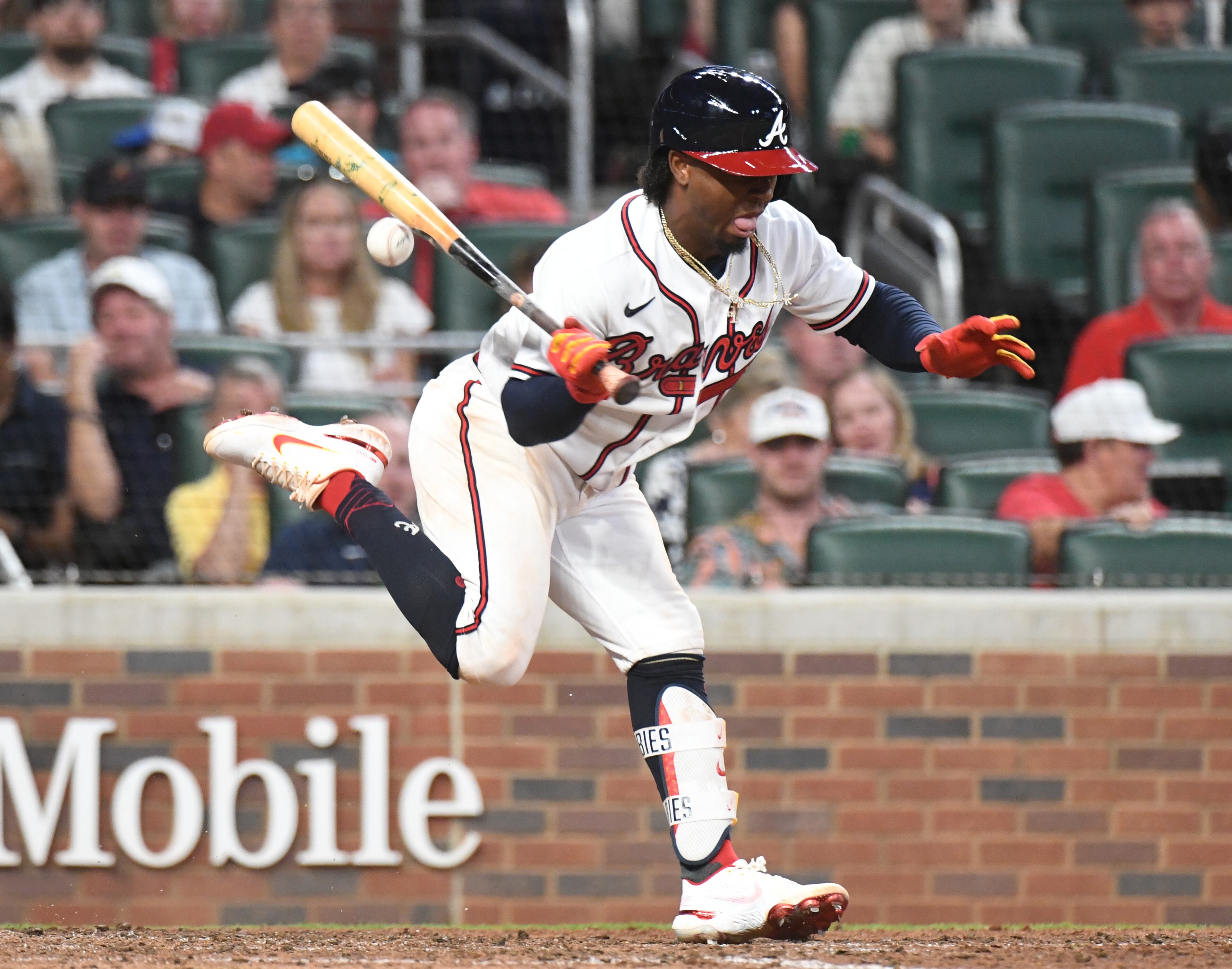 April 23, 2022 Atlanta - Atlanta Braves' second baseman Ozzie Albies (1) is hit by a pitch in the 6th inning at Truist Park on Saturday, April 23, 2022. (Hyosub Shin / Hyosub.Shin@ajc.com)