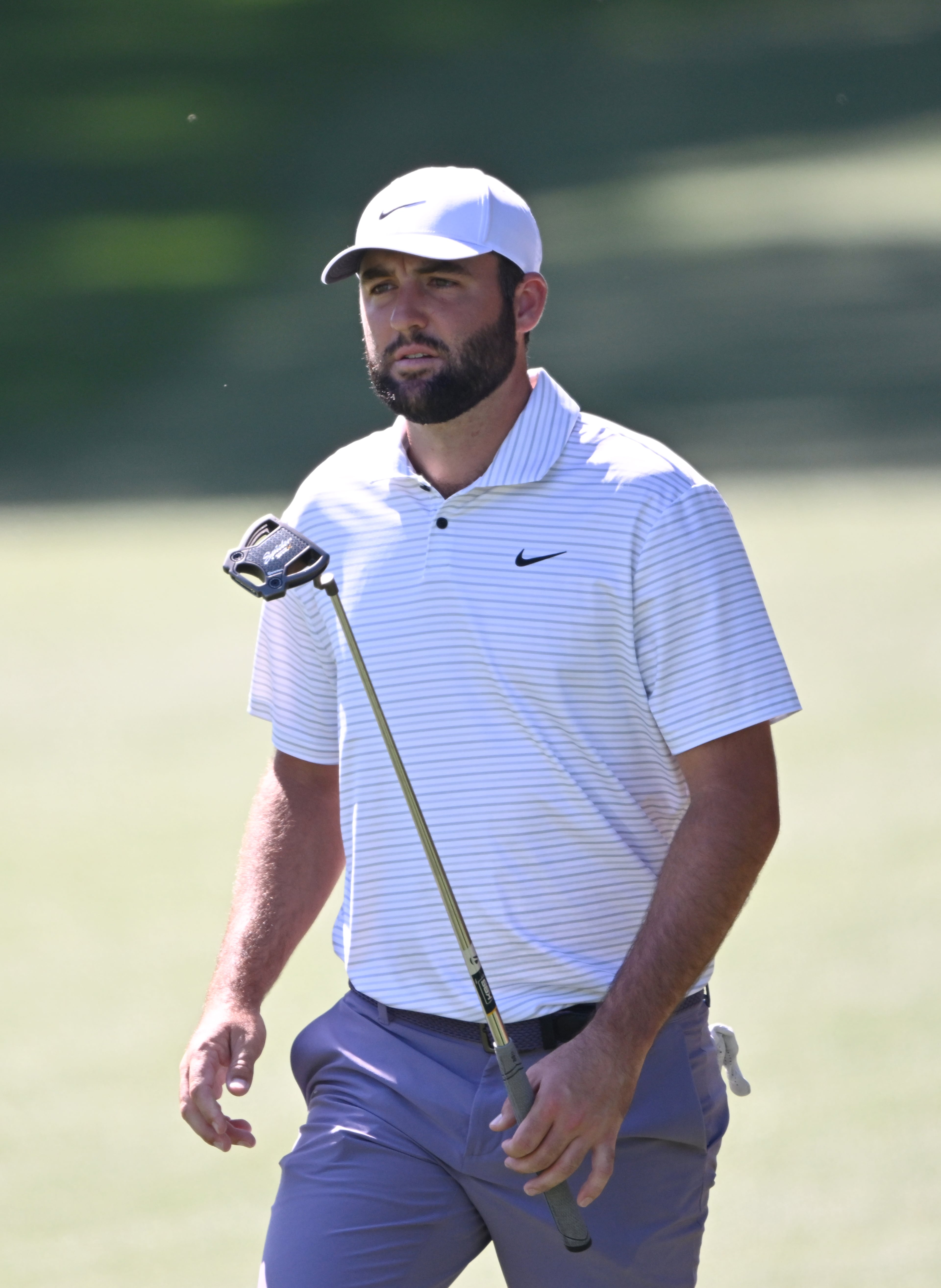 Scottie Scheffler walks up seventh fairway during third round at the 2024 Masters Tournament at Augusta National Golf Club, Saturday, April 13, 2024, in Augusta, Ga. (Hyosub Shin / Hyosub.Shin@ajc.com)