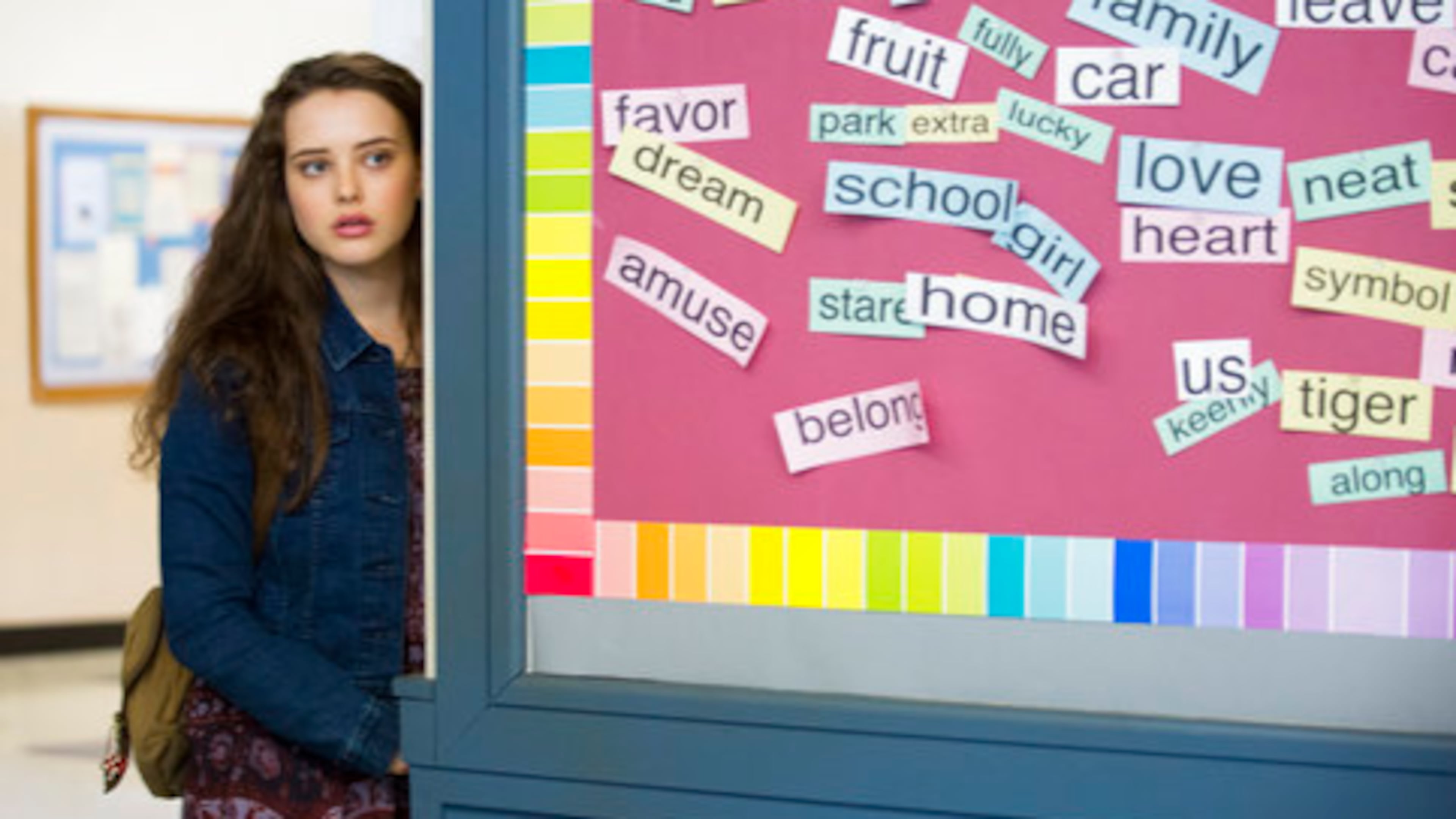 This image released by Netflix shows Katherine Langford in a scene from the series, "13 Reasons Why," about a teenager who commits suicide. The stomach-turning suicide scene has triggered criticism from some mental health advocates that it romanticizes suicide and even promoted many schools across the country to send warning letters to parents and guardians. The showâs creators are unapologetic, saying their frank depiction of teen life needs to be âunflinching and raw.â (Beth Dubber/Netflix via AP)