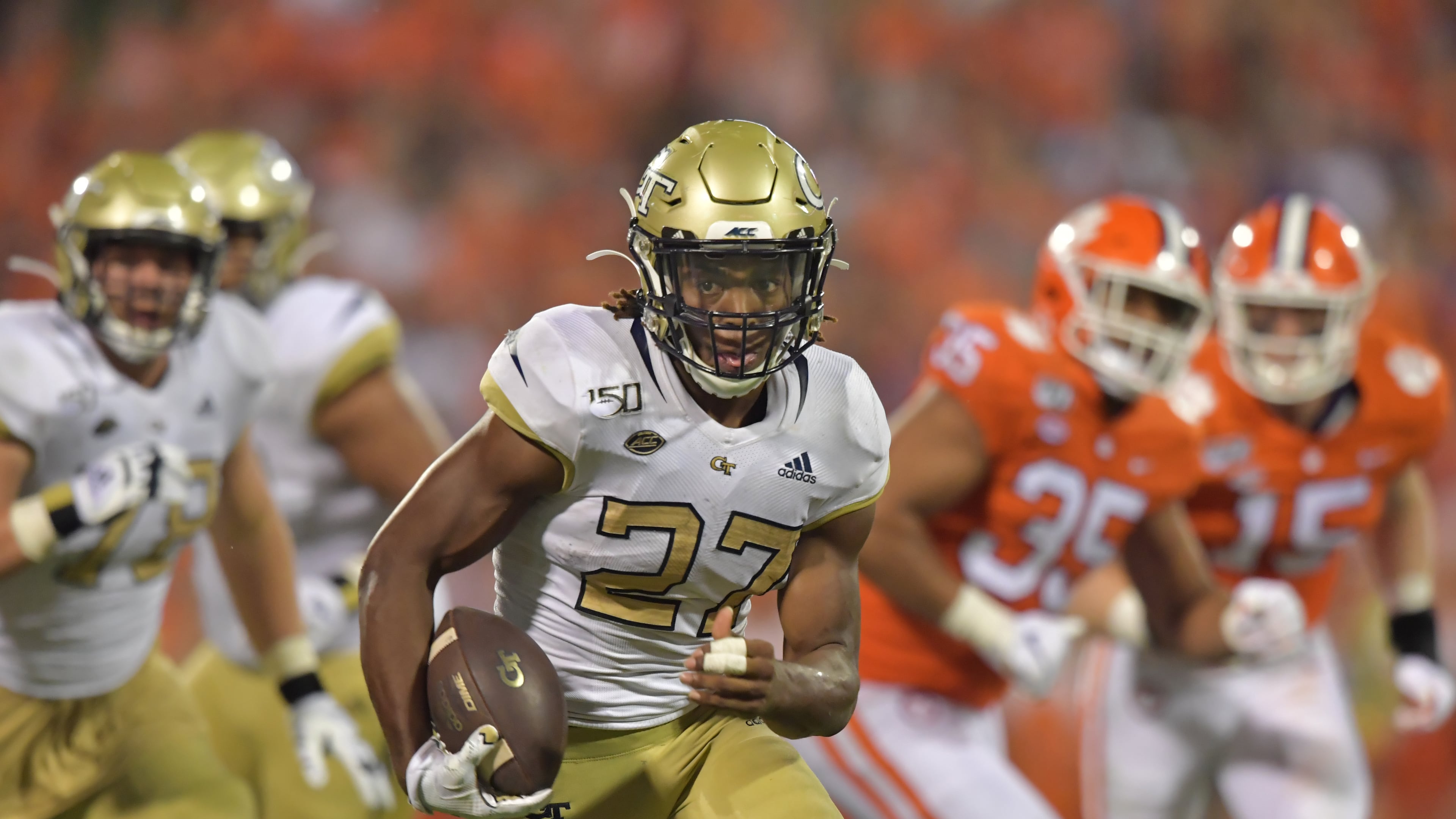 Georgia Tech running back Jordan Mason (27) runs with the ball in the second half at Memorial Stadium on the Clemson University campus in Clemson, S.C. on Thursday, August 29, 2019. Clemson won 52-14 over the Georgia Tech. (Hyosub Shin / Hyosub.Shin@ajc.com)