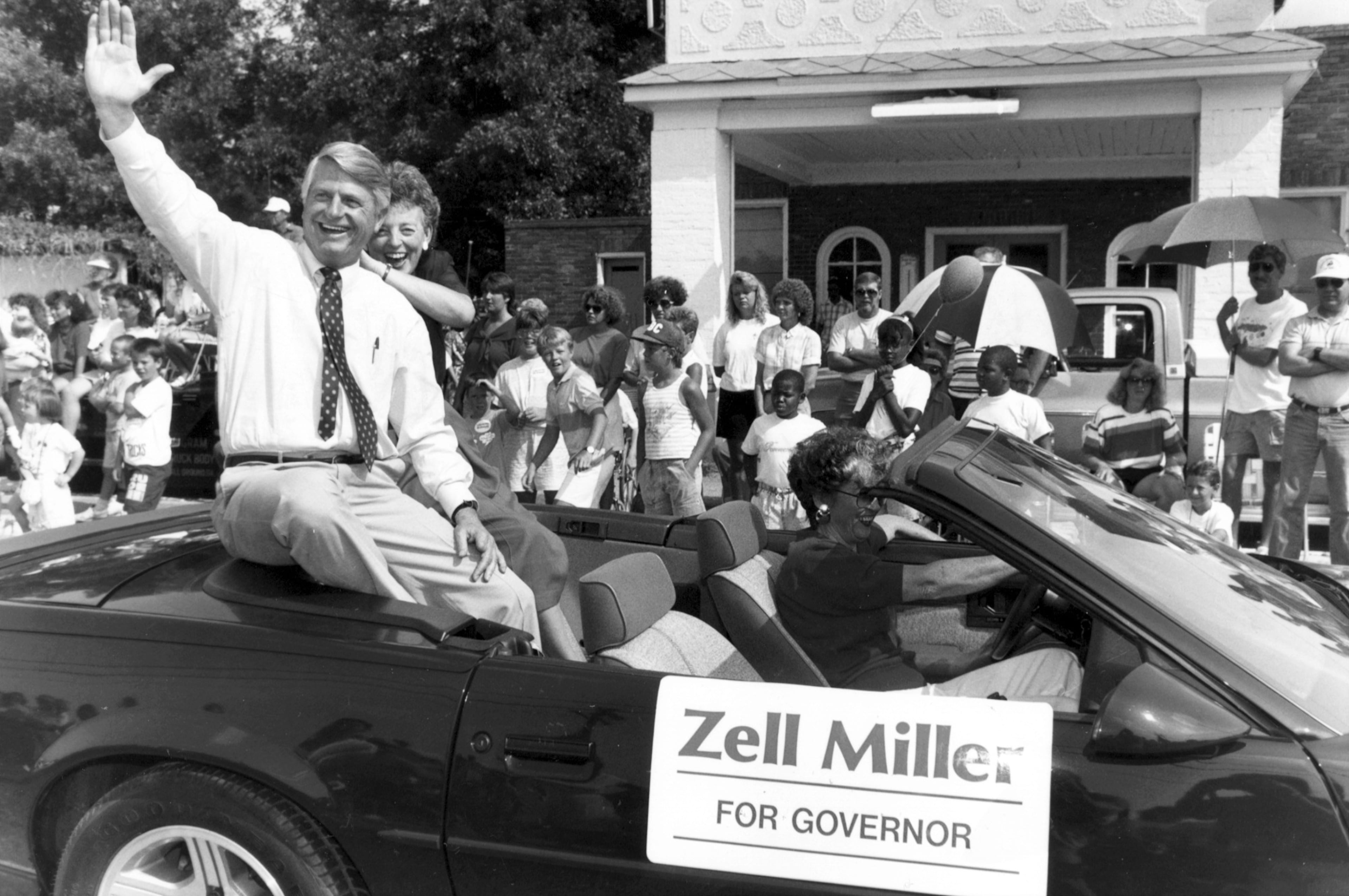 July 4, 1990. Candidate for governor Zell Miller is shown July 4 in Colbert during the Fourth of July parade there. He's shown waving to the crowd from the parade car he is riding in. Photo:Barry Williams/Special`