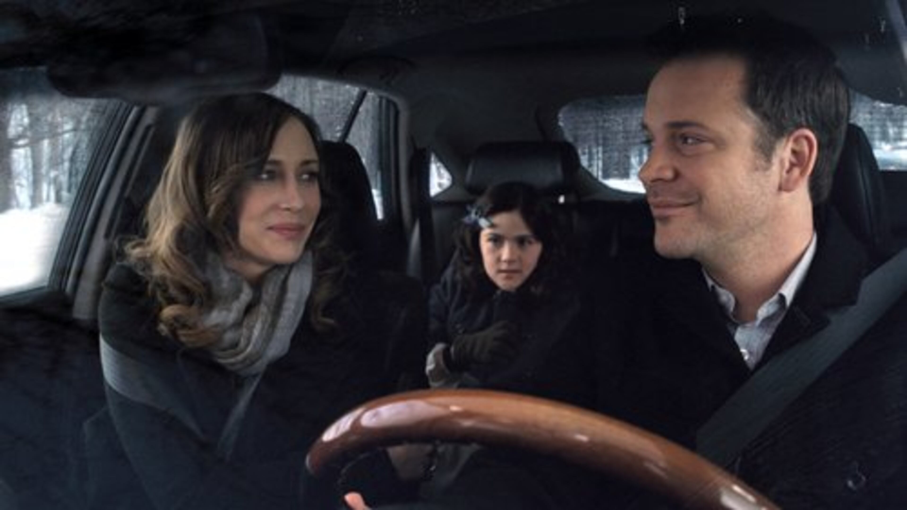 Vera Farmiga , Isabelle Fuhrmann and Peter Sarsgaard go for a ride in "Orphan."