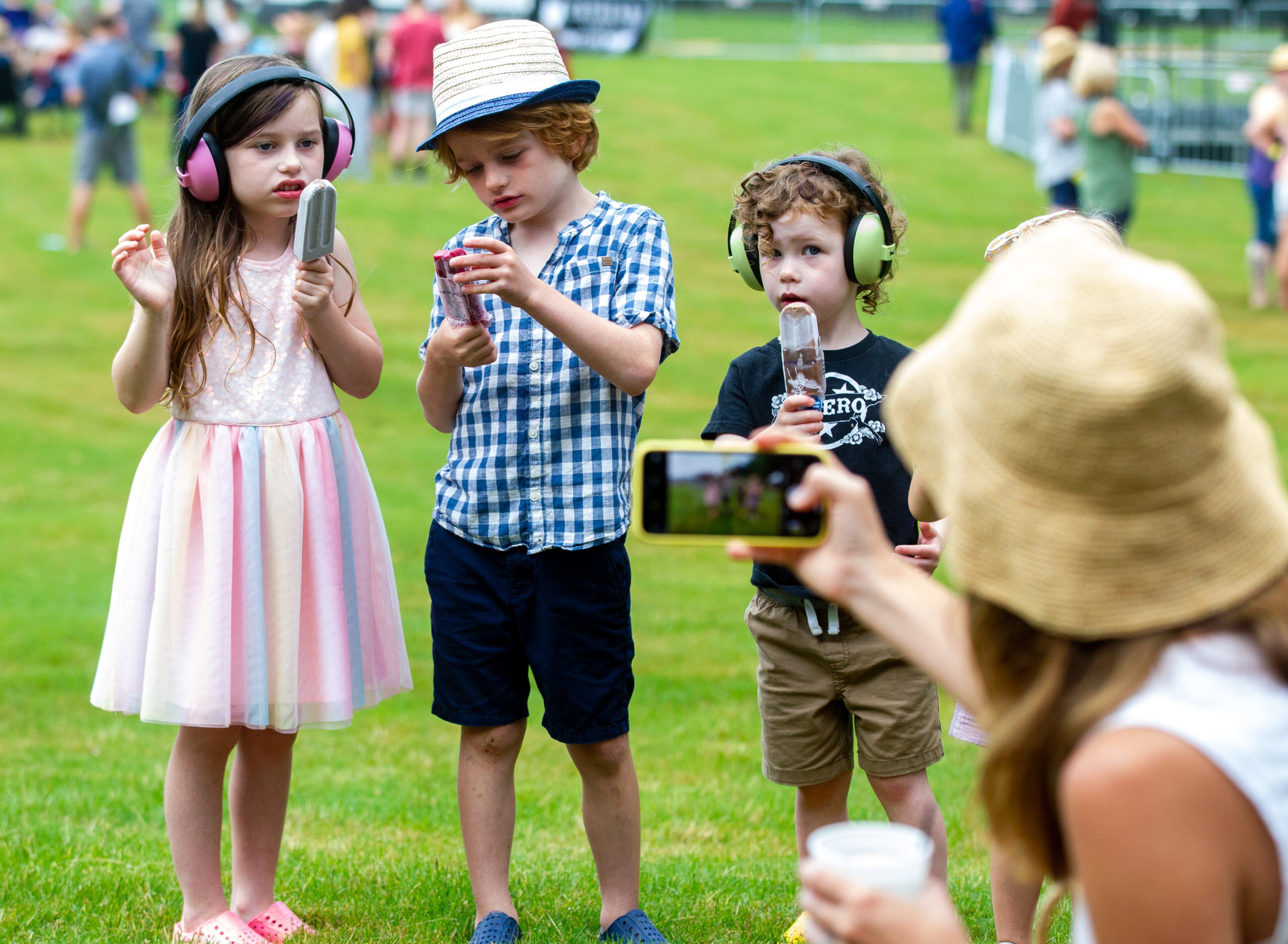 Christine Roberts takes a photograph of her kids during the Lost Art Music Festival in Douglasville on Saturday, June 12, 2021. STEVE SCHAEFER FOR THE ATLANTA JOURNAL-CONSTITUTION