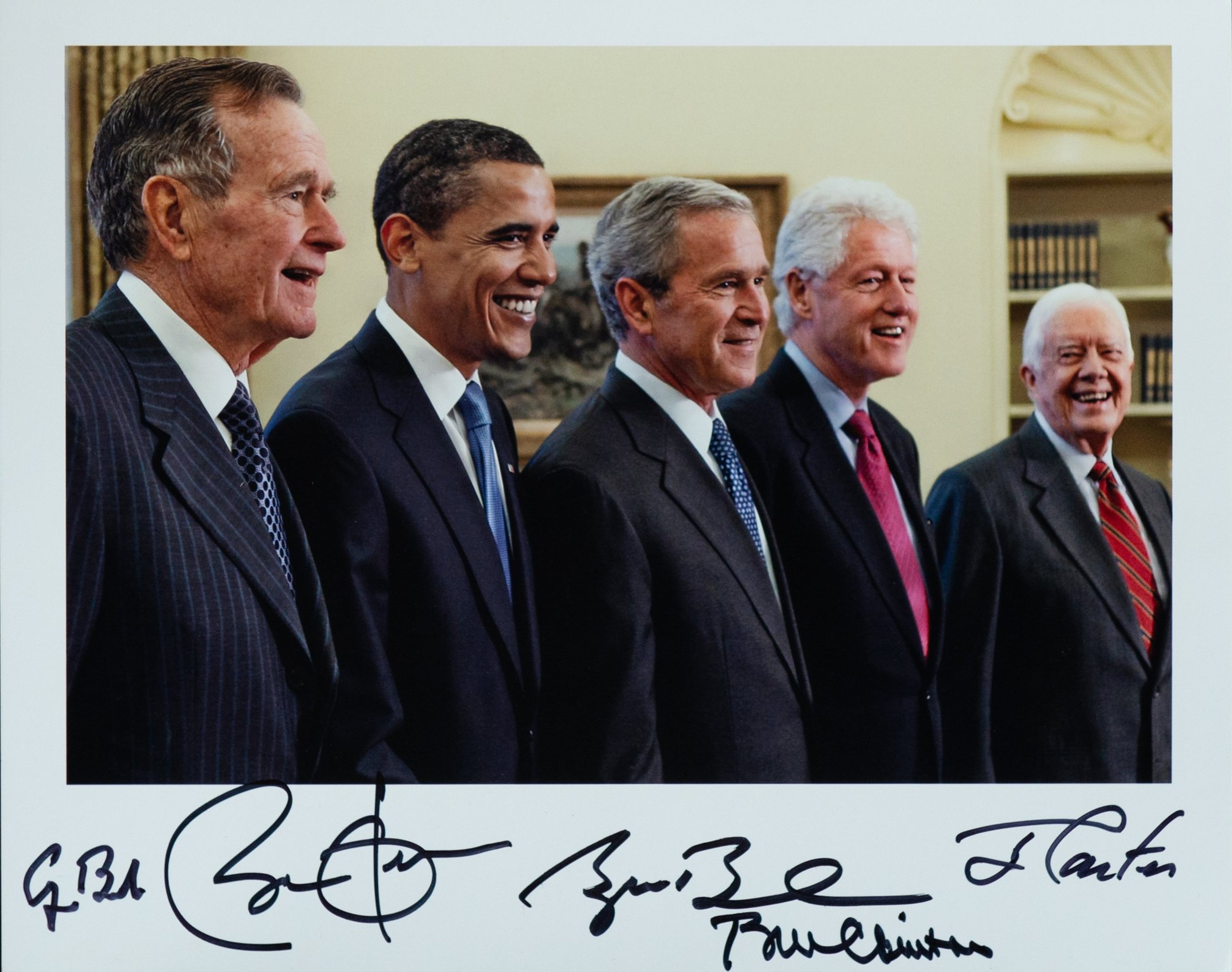 A signed photograph of five U.S. presidents — George H.W. Bush, Barack Obama, George W. Bush, Bill Clinton, and Jimmy Carter — will be among the items Carter will be auctioning off this week to raise funds to support The Carter Center. Another photo, signed by Carter, George H.W. Bush, Gerald Ford, Ronald Reagan and Richard Nixon, will also be up for auction. (Carter Center)