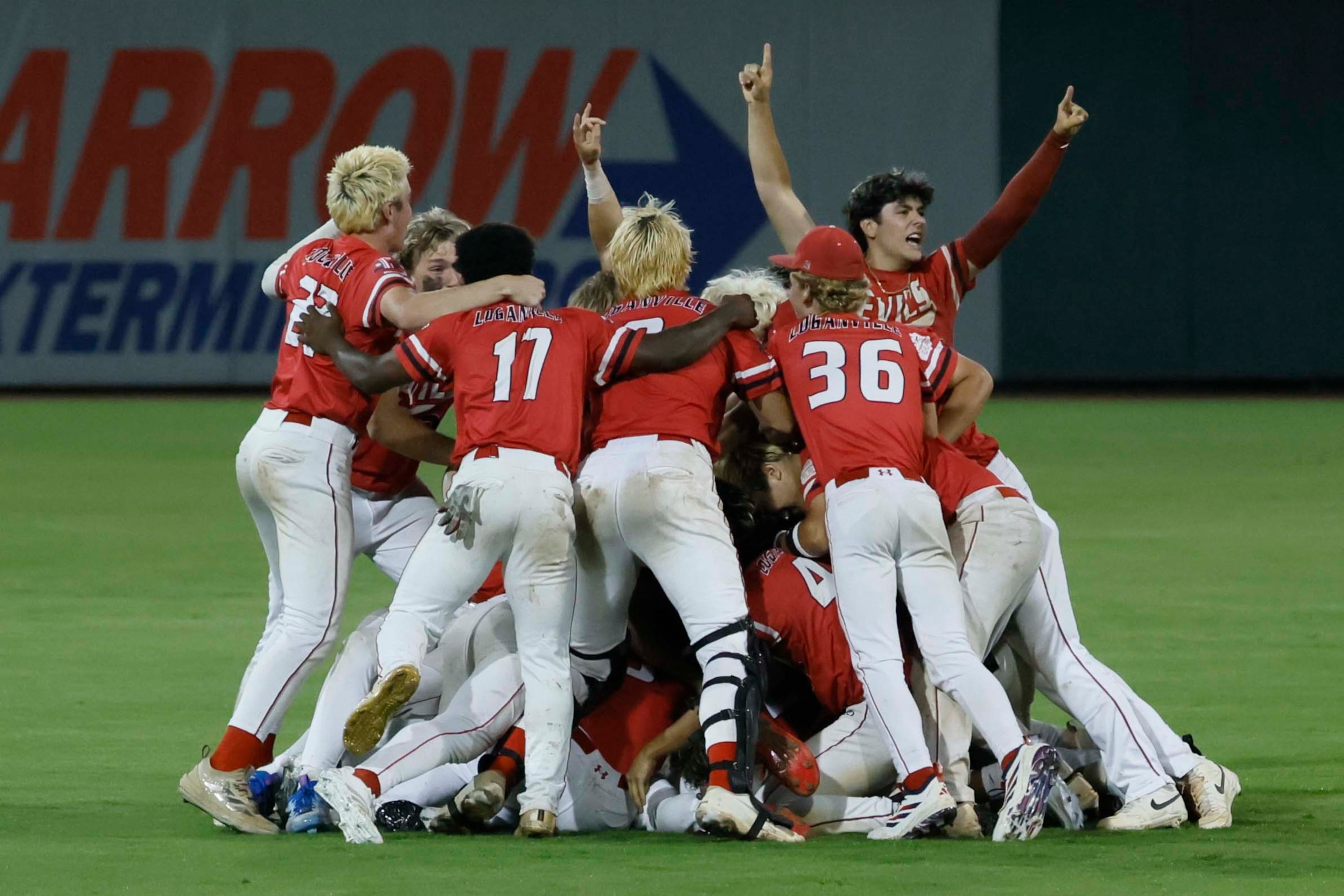 Loganville players celebrate after winning 4-3 against Pope in Game 3 of the Class 5A GHSA Baseball State Championship Series at Gwinnett Field on Tuesday, May 26, 2026, in Lawrenceville, Ga. Loganville won the series 4-3. (Miguel Martinez/AJC)