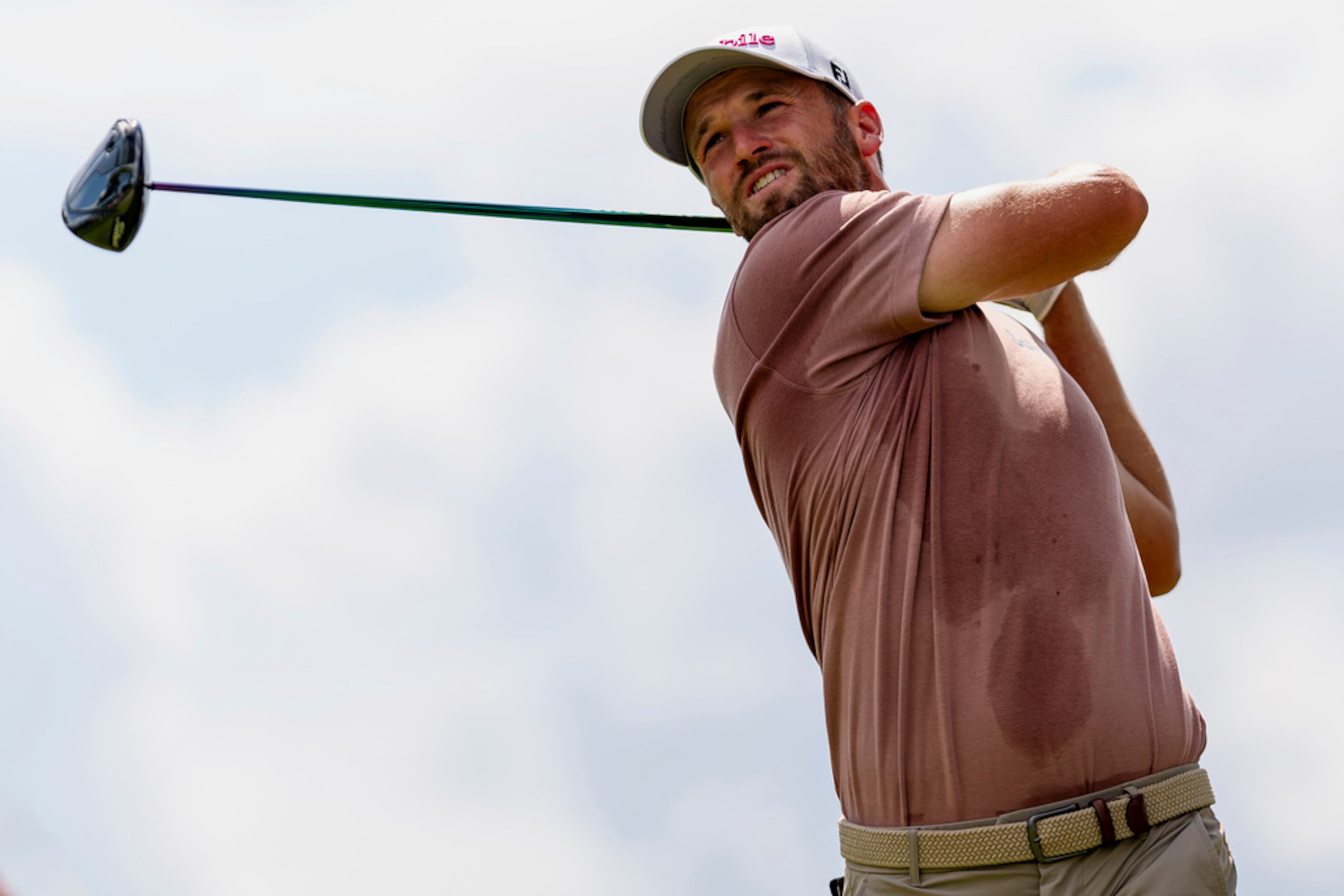 Wyndham Clark hits his drive from the fourth tee during the third round of the Tour Championship golf tournament, Saturday, Aug. 31, 2024, in Atlanta. (AP Photo/Jason Allen)
