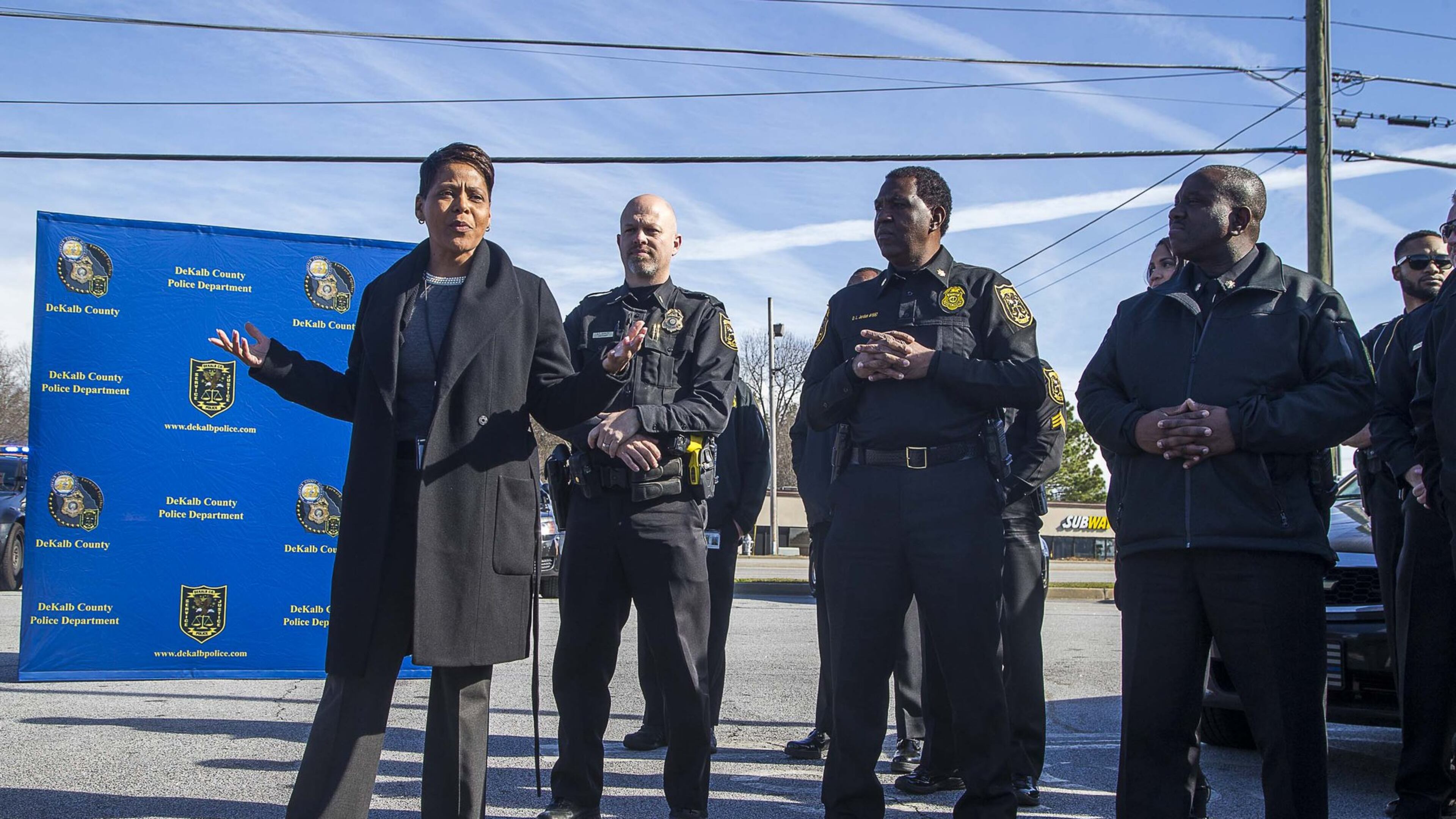 DeKalb County Police Chief Mirtha V. Ramos (left) speaks to members of the DeKalb County police department during a community roll call at the Wesley Center Square shopping center in Decatur, on Wednesday, January 22, 2020. (ALYSSA POINTER/ALYSSA.POINTER@AJC.COM)