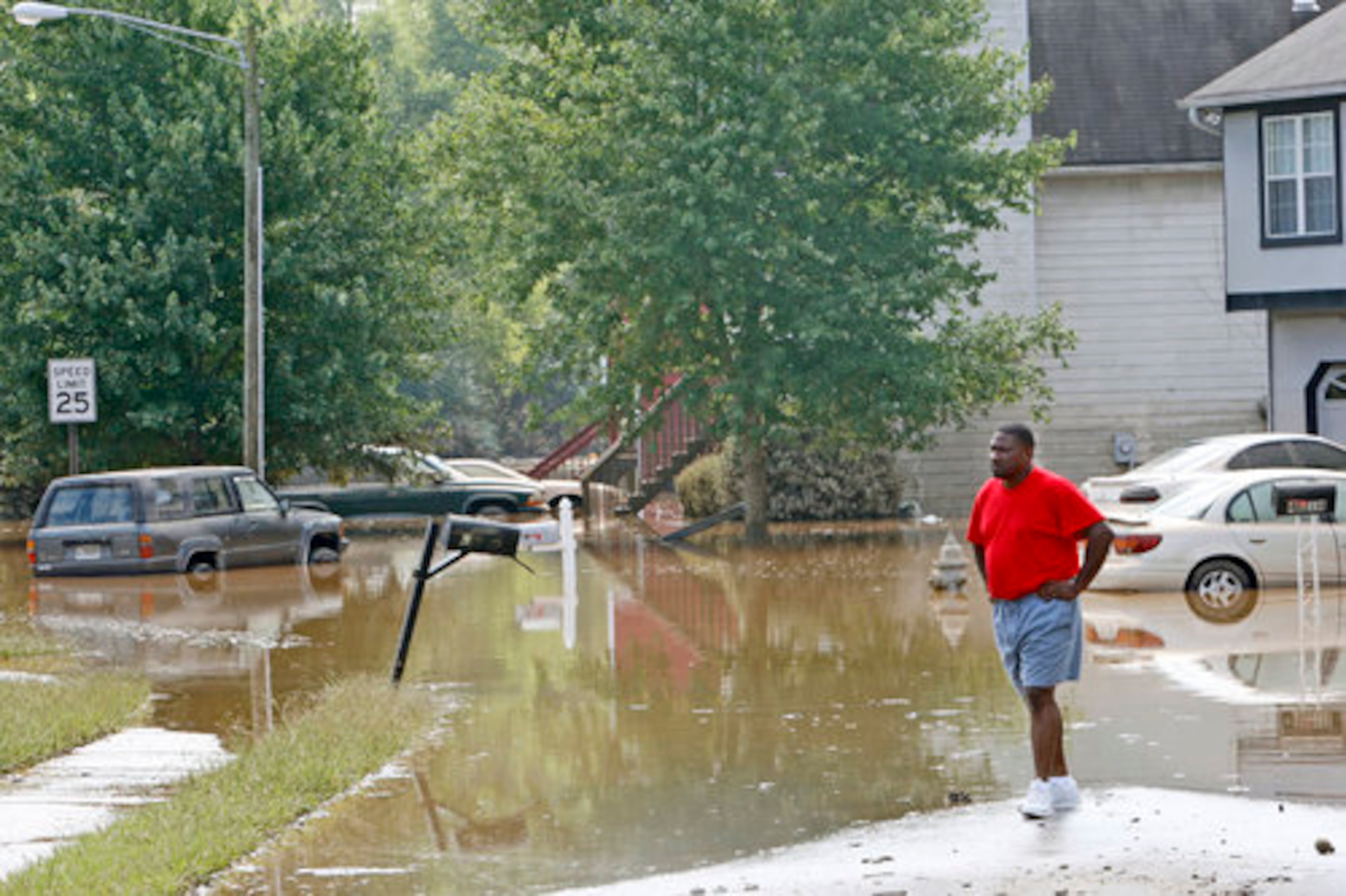 Tydus Tarver's Powder Springs house burned to the ground when firefighters had to abandon it because of rising flood waters. He has lived here since 1996. "It's flooded, but not like this before," he said.