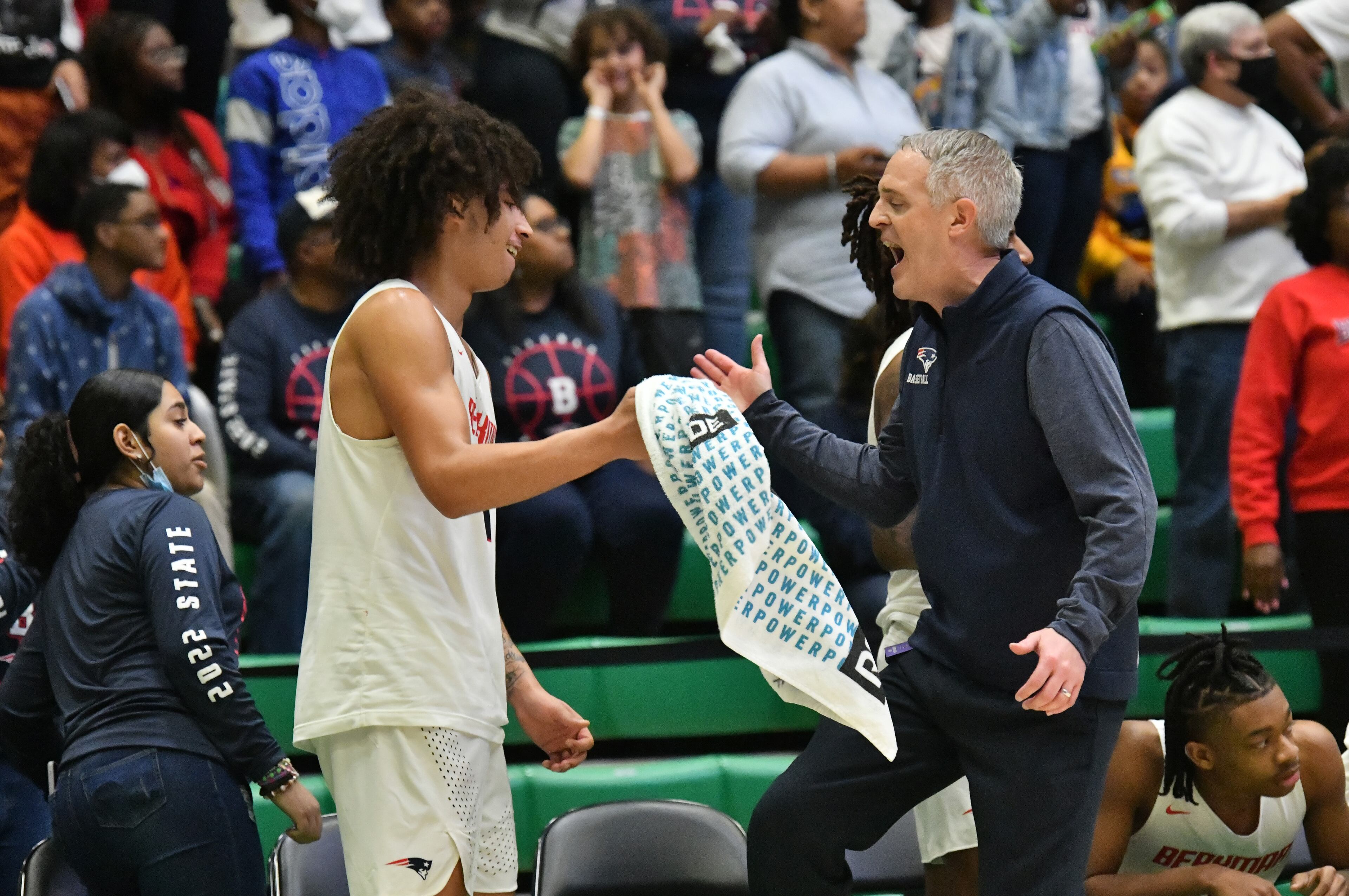 Berkmar celebrates at the end of the 4th quarter during 2022 GHSA Basketball Playoffs at Buford Arena on Friday, March 4, 2022. Berkmar won 72-58 over Pebblebrook. (Hyosub Shin / Hyosub.Shin@ajc.com)