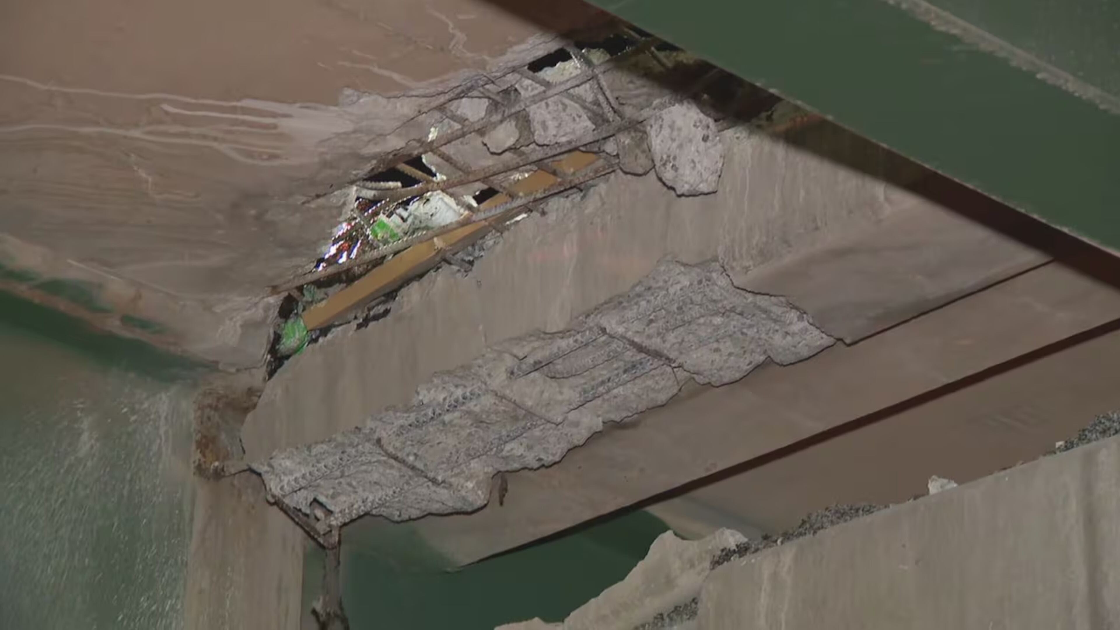 The hole is visible from Meadowbrook Lane under I-75. (Channel 2 Action News)