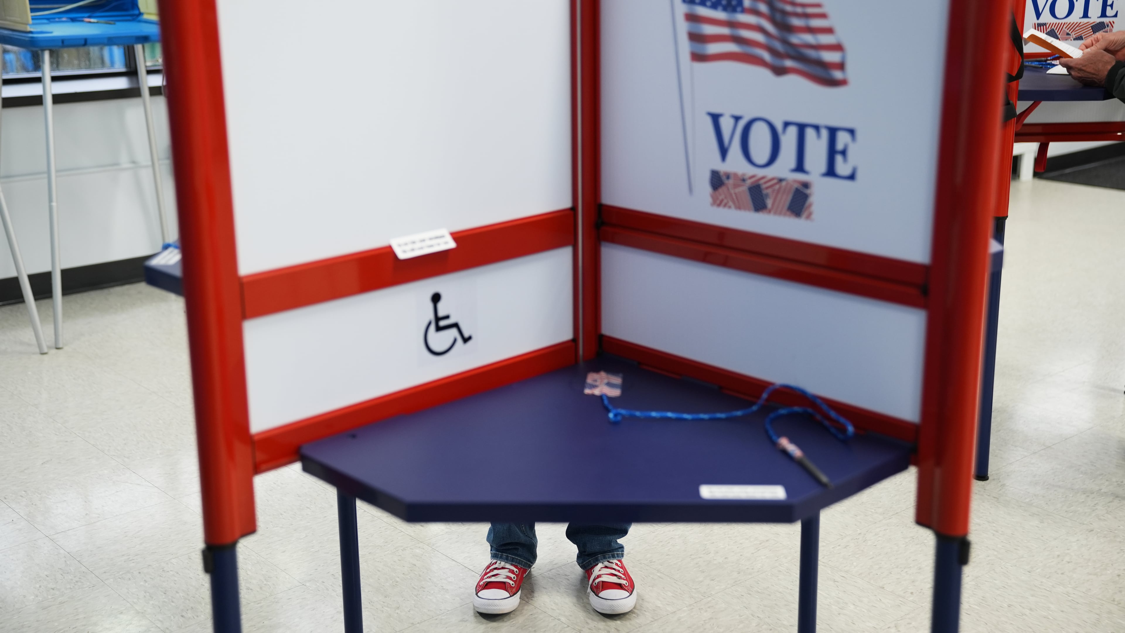 Voters cast their ballots on the first day of early voting in Minnesota at the Elections & Voter Services building, Friday, Sept. 18, 2026, in Minneapolis. (AP Photo/Ellen Schmidt)