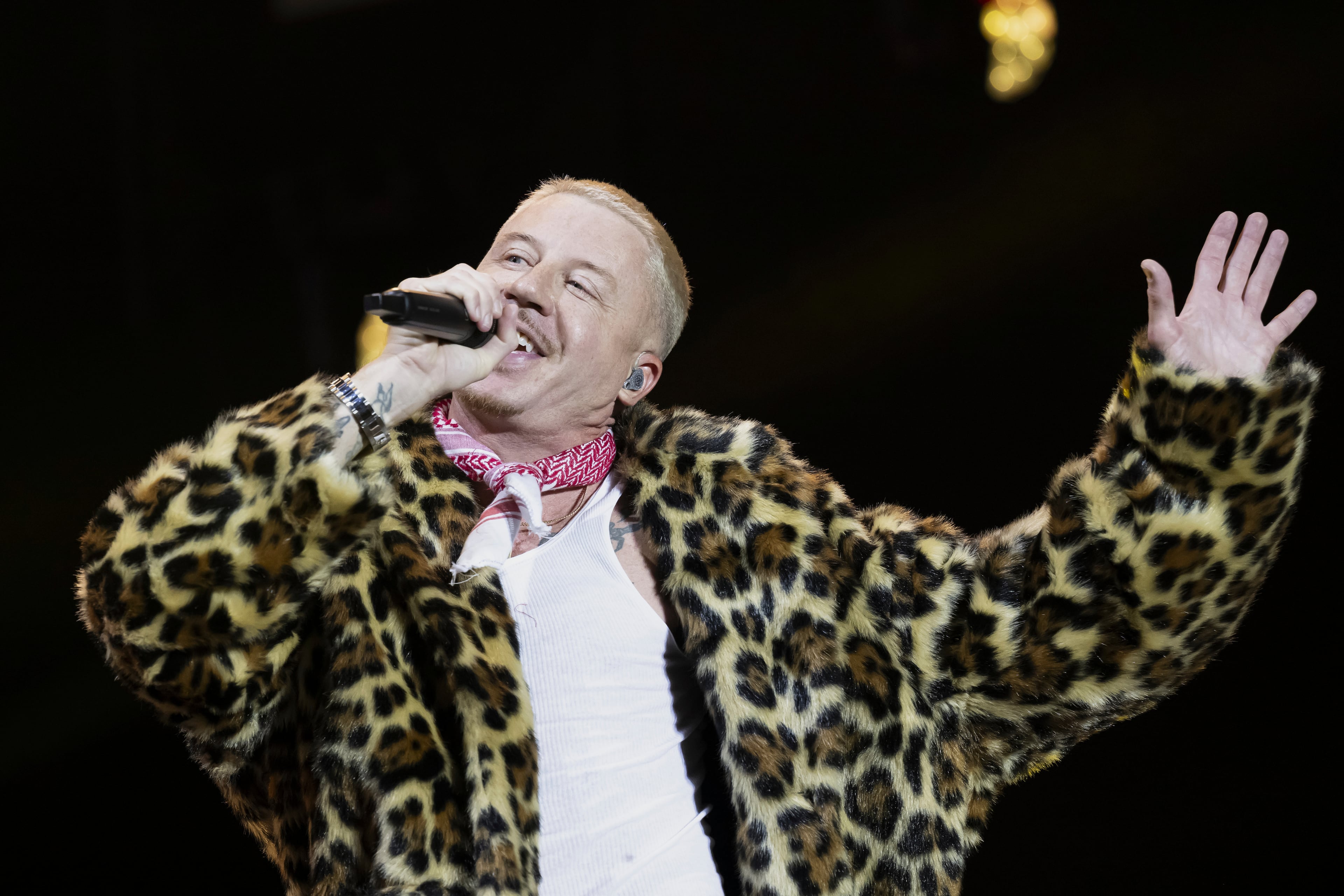 Rapper Macklemore performs on the main stage at the 42th Gurtenfestival edition in Bern, Switzerland. He was removed from Ed Sheeran's tour after comments he made onstage in support of Palestinian liberation. (Anthony Anex/Keystone via AP 2025)