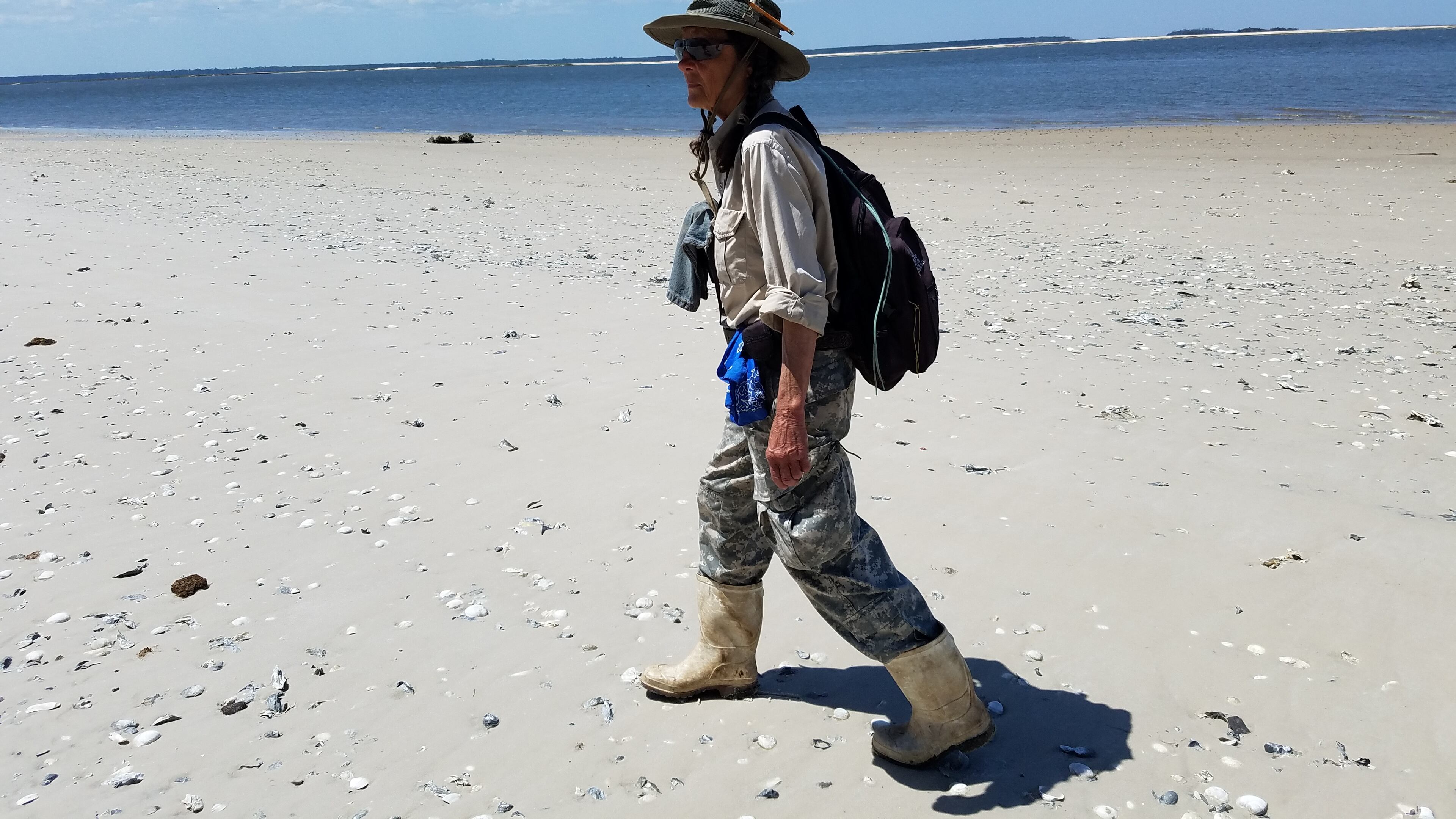 Carol Ruckdeschel walks along the shore of Cumberland Island, which sits across the Intracoastal Waterway from the site of a proposed spaceport in Camden County. Maya T. Prabhu/maya.prabhu@ajc.com