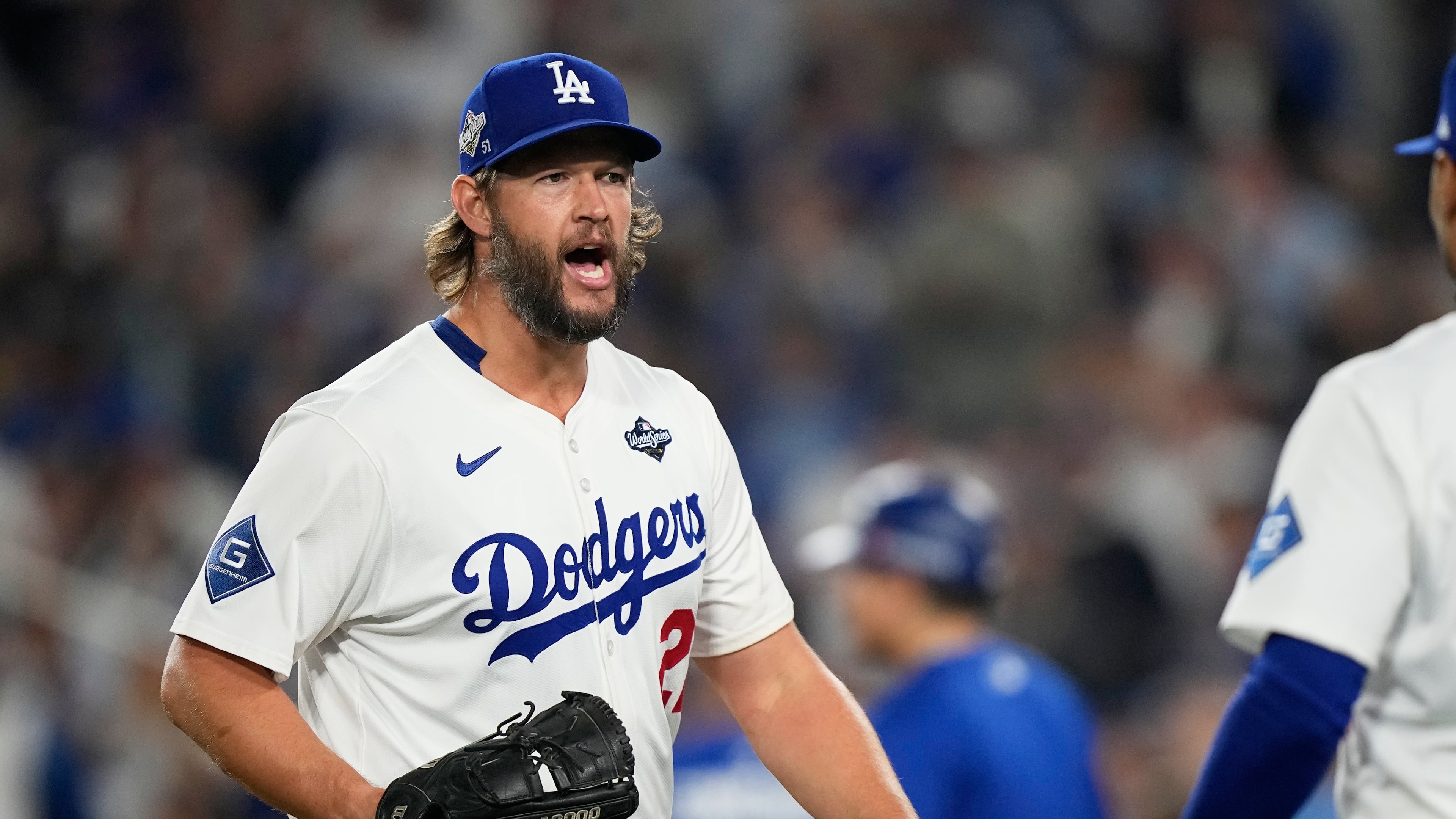 FILE - Los Angeles Dodgers pitcher Clayton Kershaw celebrates the end of the top of the 12th inning against the Toronto Blue Jays in Game 3 of baseball's World Series, Monday, Oct. 27, 2025, in Los Angeles. (AP Photo/Brynn Anderson, File)