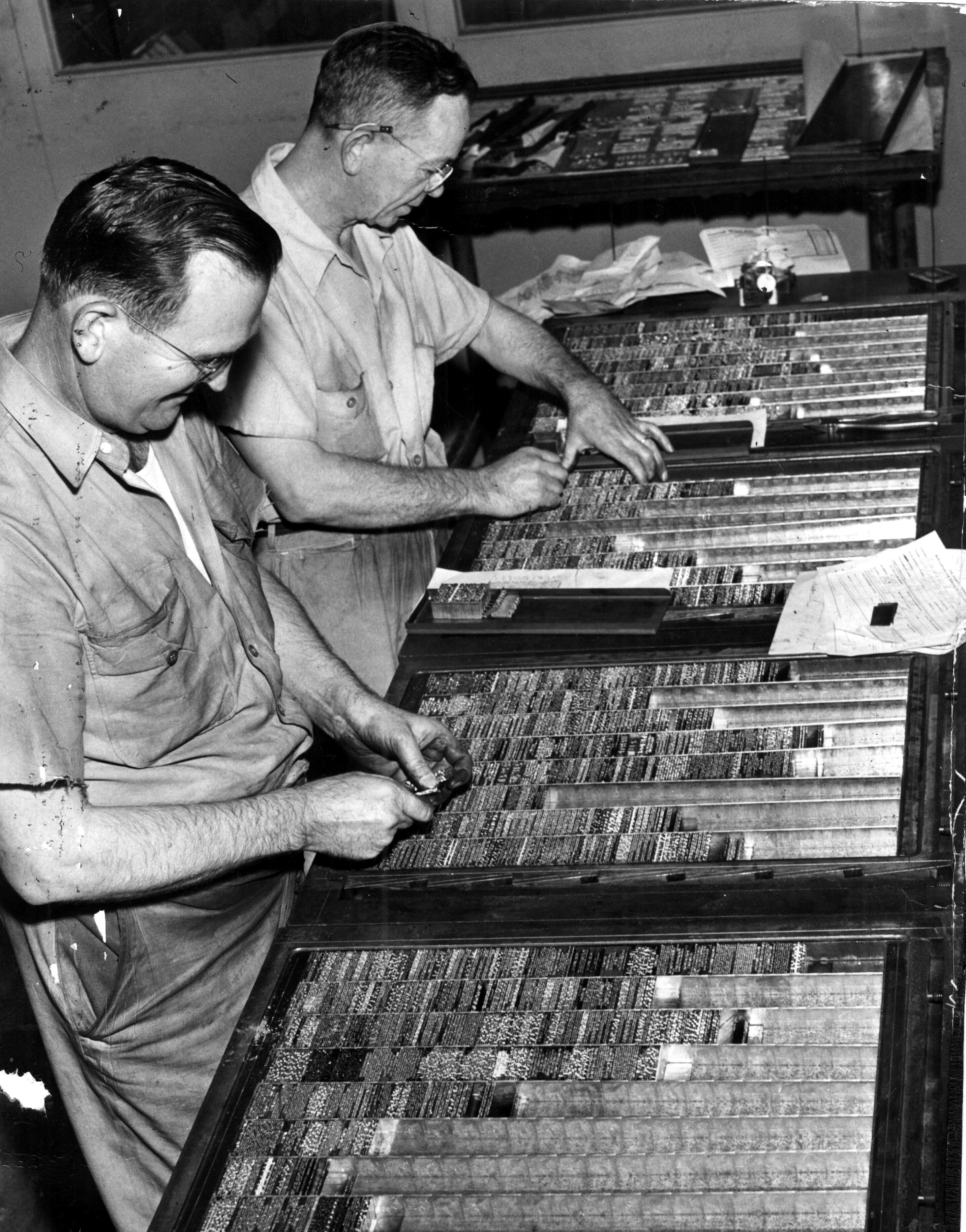 The Atlanta Journal composing room is where the first process in the printing cycle -- setting the type in metal by linotype operators -- happens. We can tell you that the job has changed quite a bit since 1949.