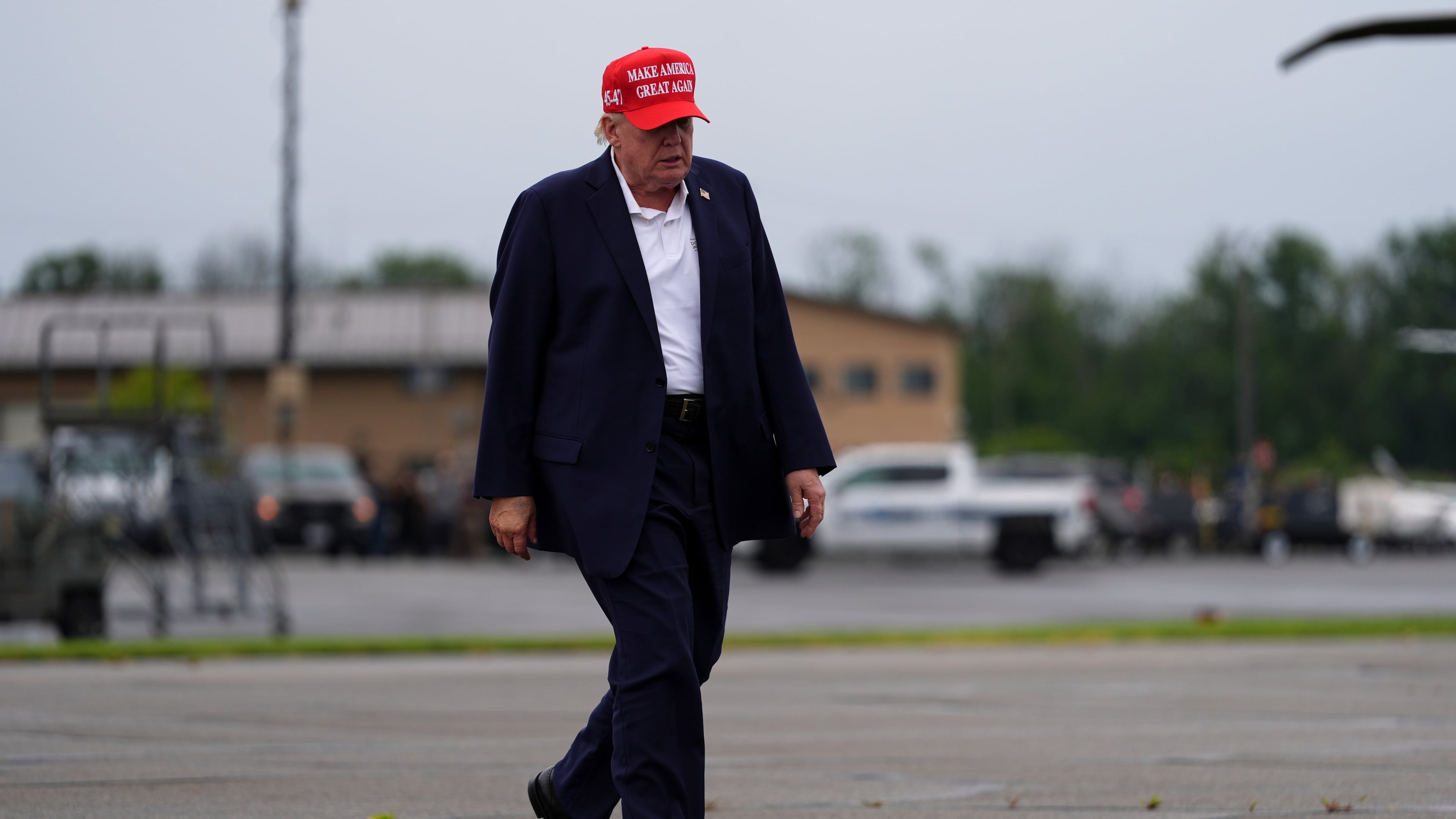 President Donald Trump walks to board Air Force One at Morristown Airport, Sunday, Aug. 16, 2026, in Morristown, N.J. (AP Photo/Julia Demaree Nikhinson)