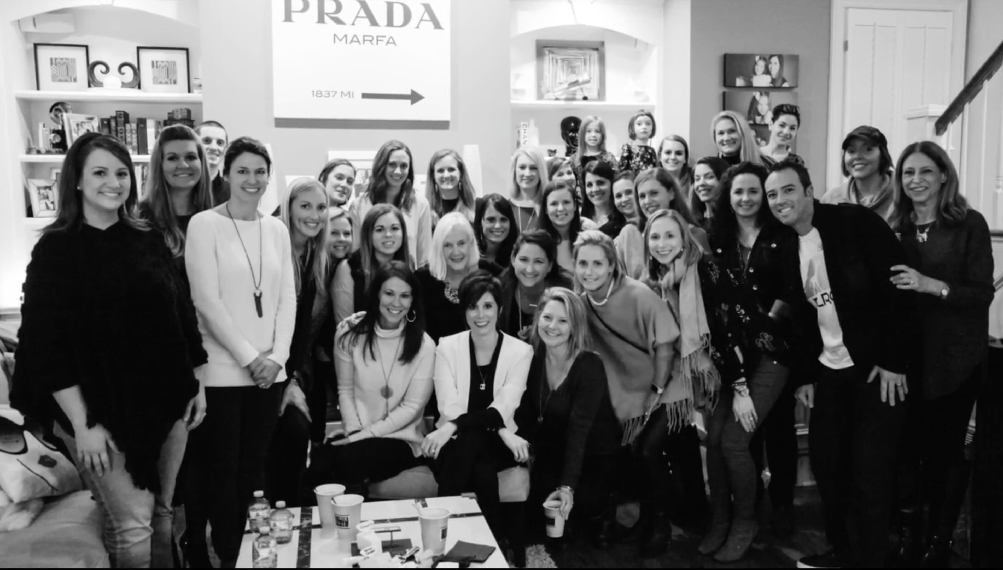 Emily Westergreen, seated, front and center, shows off her new look.