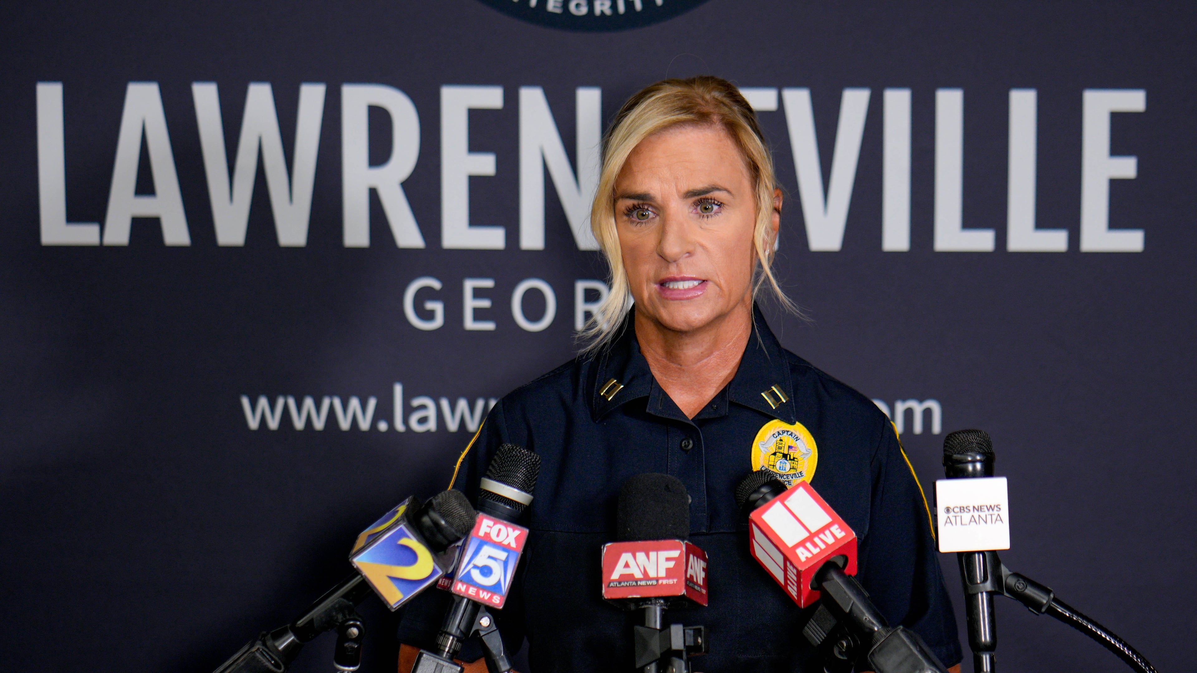 Lawrenceville police spokesperson Capt. Dena Pauly speaks to reporters Thursday, July 30, 2026, about the death of a 1-year-old boy who police said was left in a hot car the day before. (Ben Hendren for the AJC)