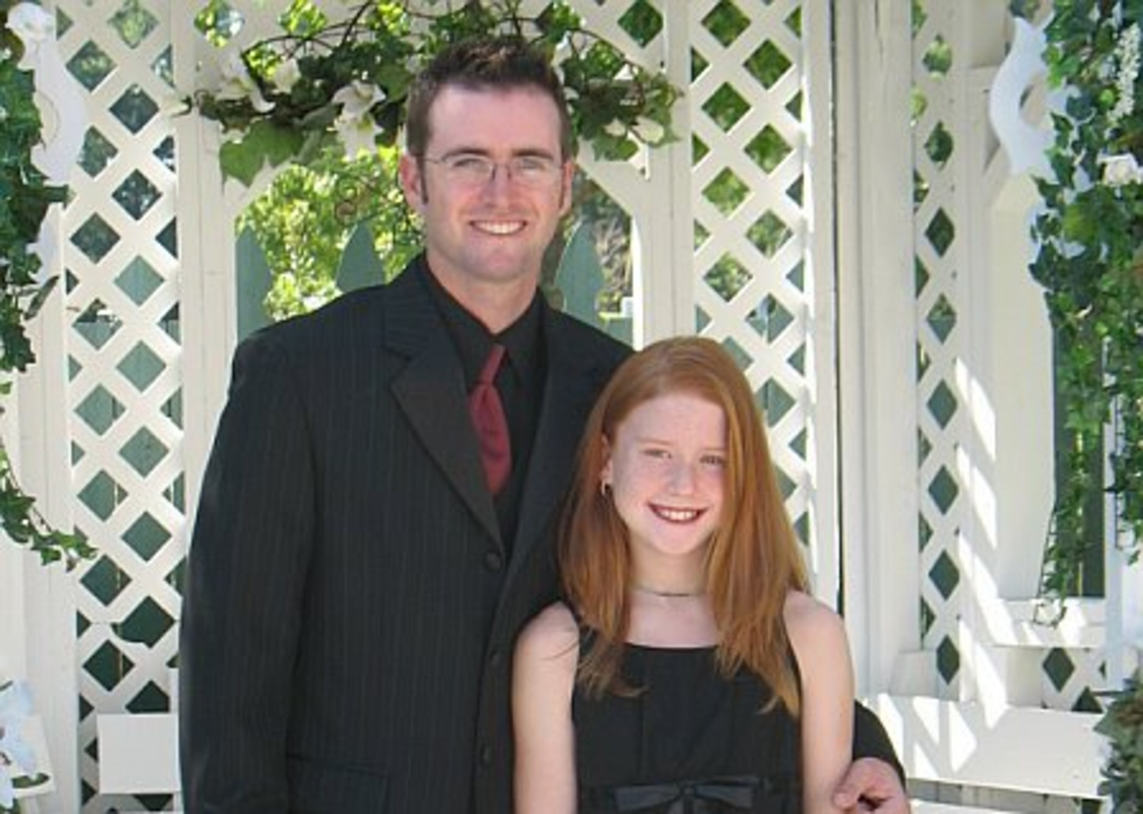 My beautiful daughter, Hayley with my brother on his wedding day