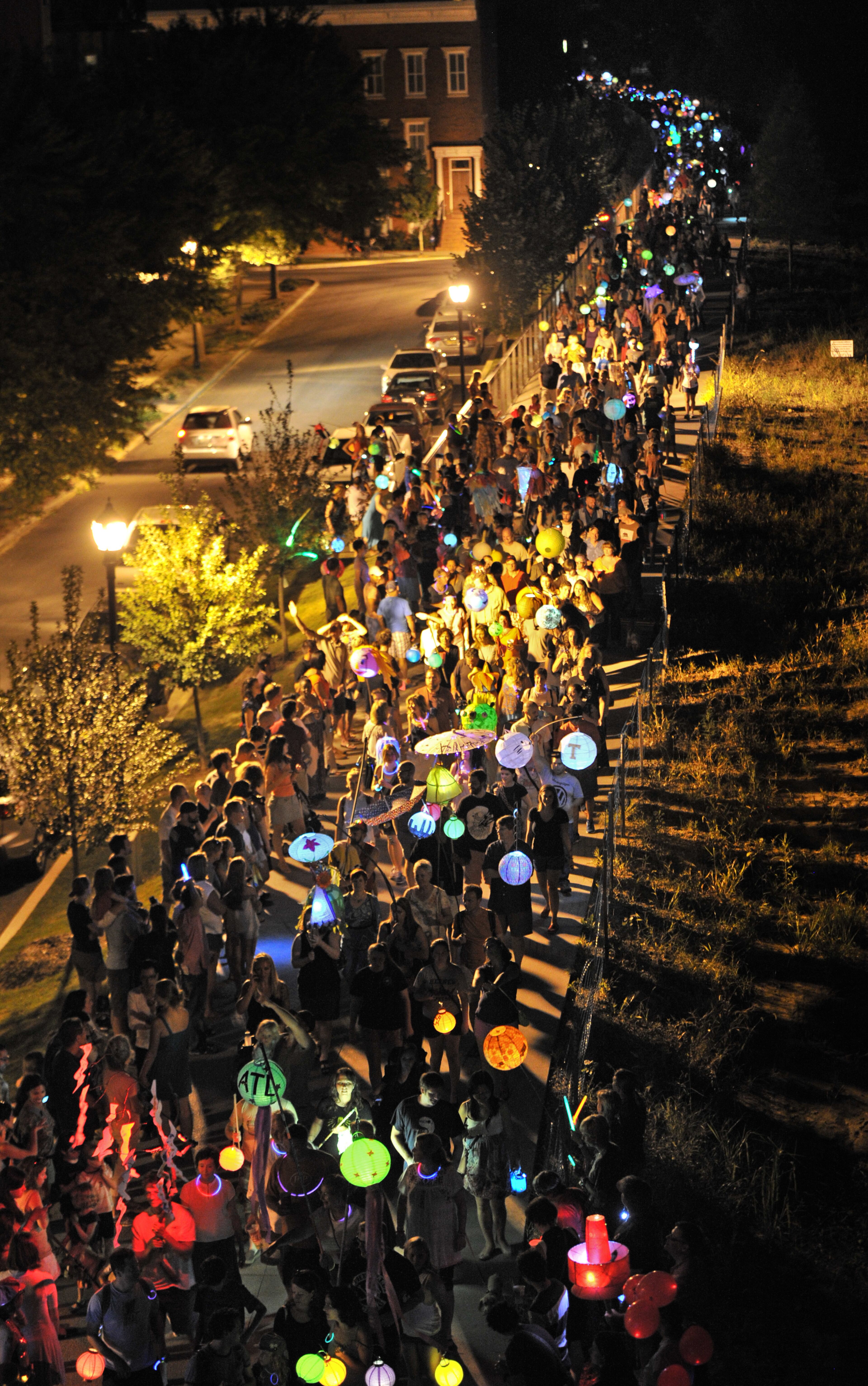 Hundreds of parade participants float on the Eastside Trail of the Atlanta BeltLine during the 2013 Atlanta BeltLine Lantern Parade on Sept. 7, 2013.