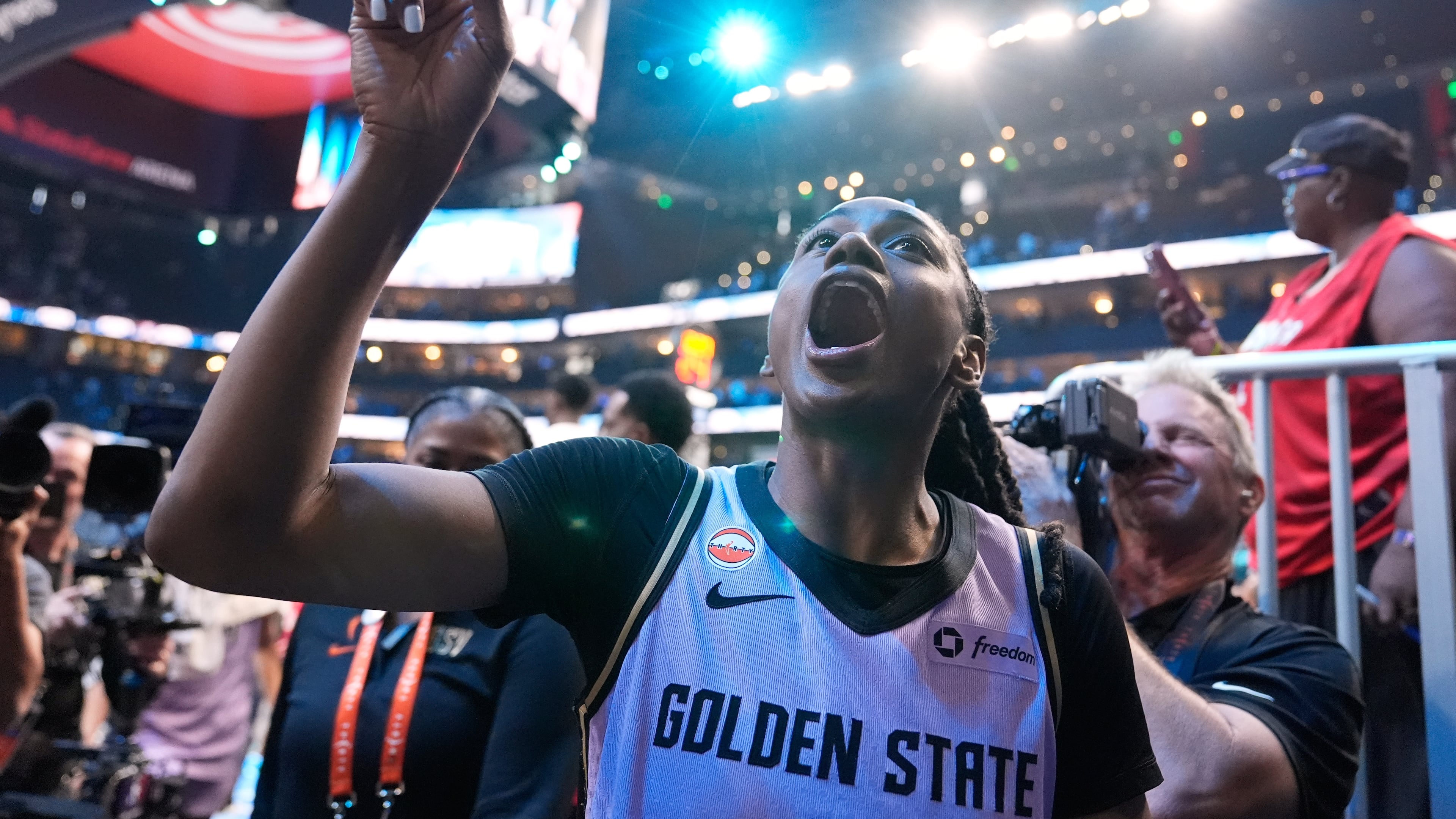 Golden State Valkyries guard Tiffany Hayes (15) talks to fans after Game 4 of the WNBA basketball finals against the Atlanta Dream on Saturday, Oct. 24, 2026, in Atlanta. (AP Photo/Brynn Anderson)
