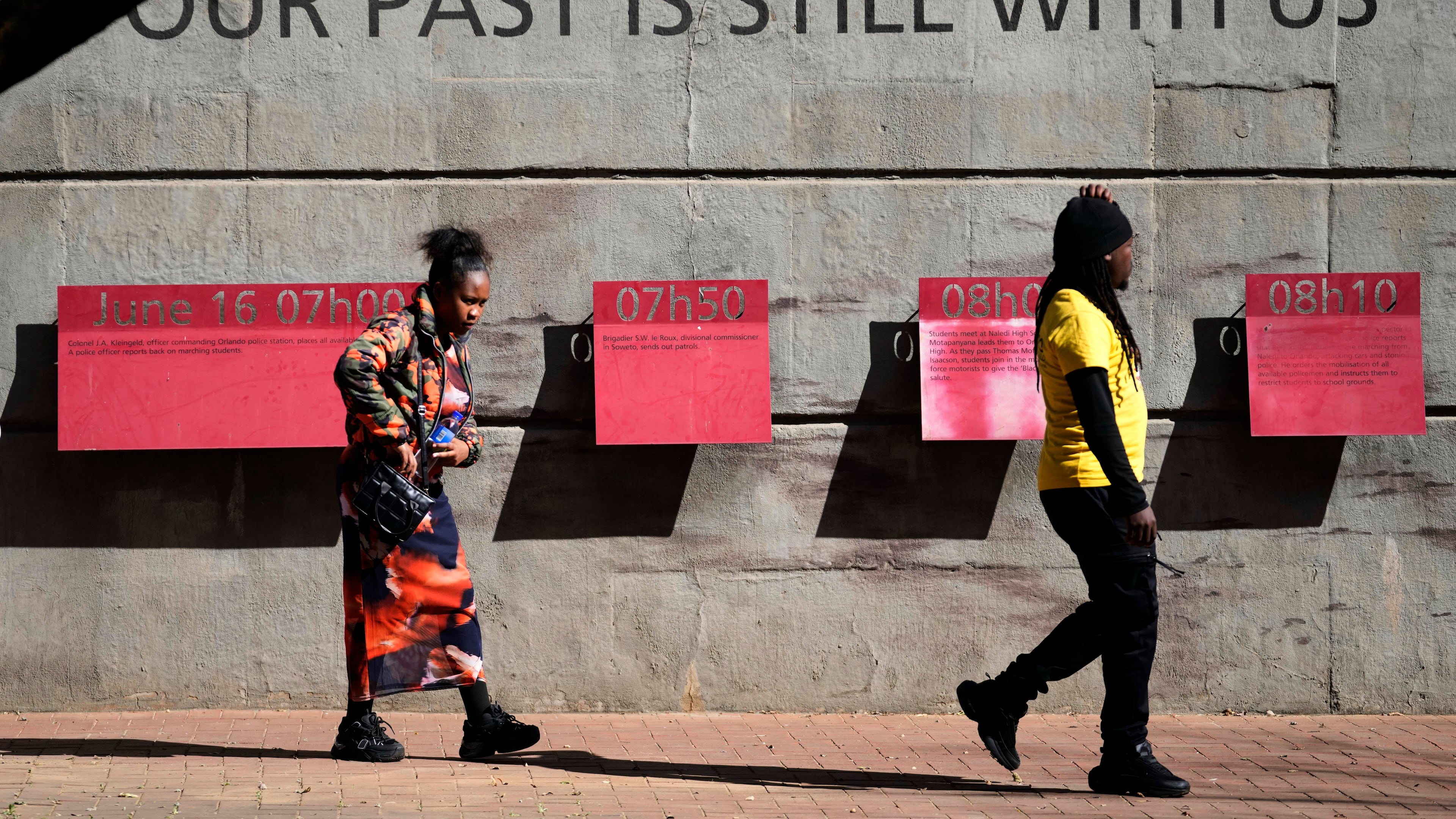 Youth visit the June 16 Memorial Acre, in Soweto, South Africa, Monday, June 15, 2026. (AP Photo/Themba Hadebe)