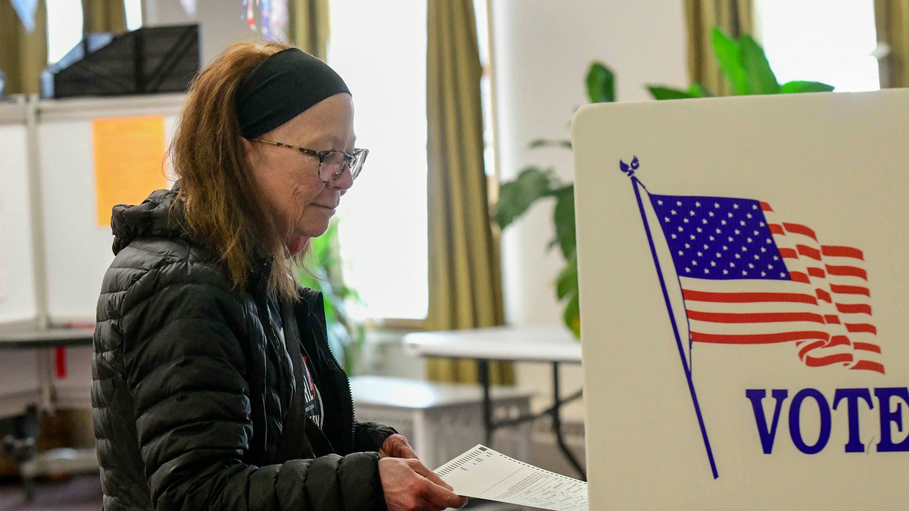 Kathleen Nutter of Wilmington, Vt., casts her ballot at the polling station in Wilmington, during Town Meeting Day in Vermont, Tuesday, March 3, 2026. (Kristopher Radder/The Brattleboro Reformer via AP)