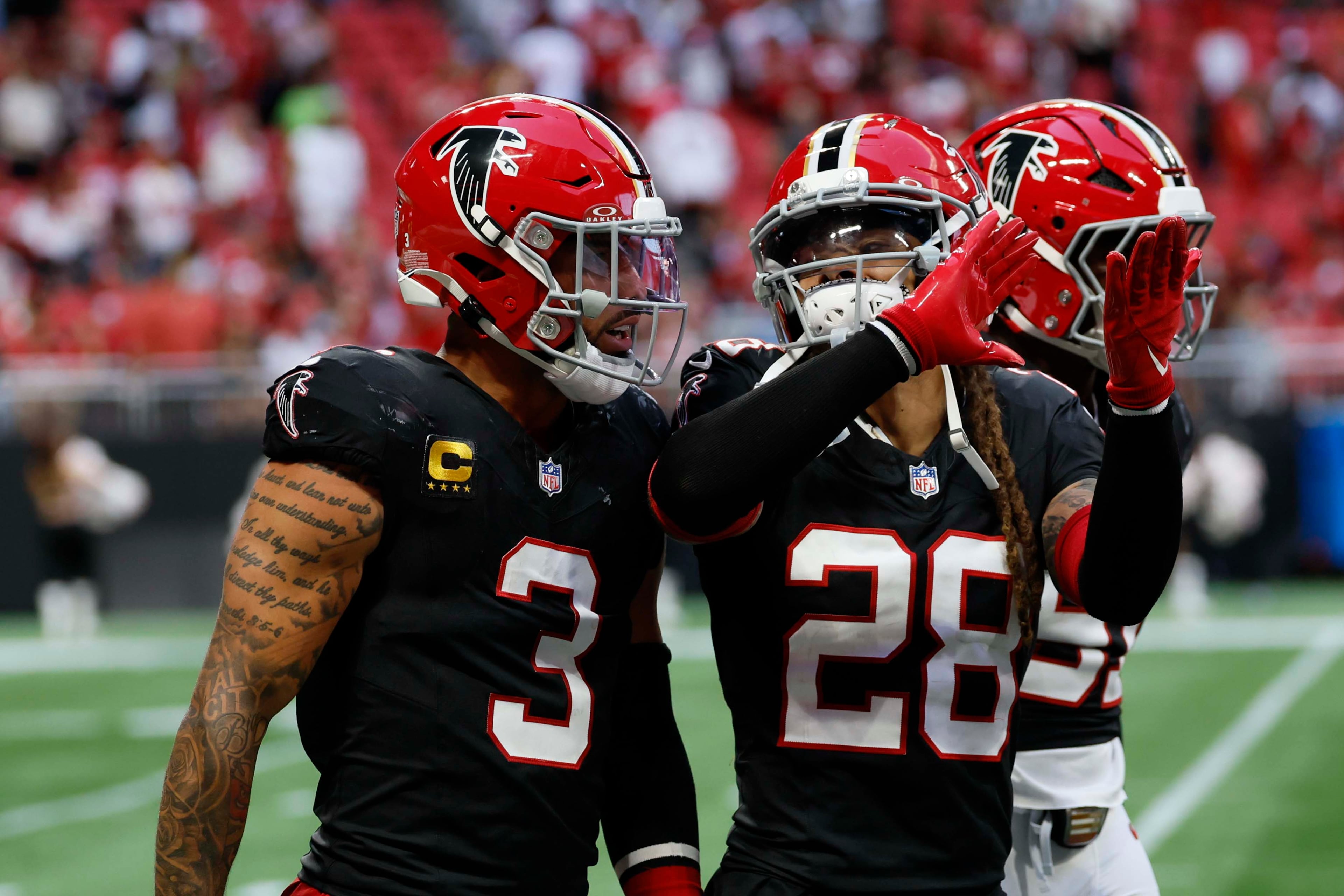 Atlanta Falcons defensive back Mike Ford (28) celebrates with safety Jessie Bates (3) after forcing a fumble in the final seconds of Sunday’s game against the San Francisco 49ers at Mercedes-Benz Stadium in Atlanta, GA, on Oct. 25, 2026. The Falcons defeated the 49ers 29-20. (Miguel Martinez/AJC)