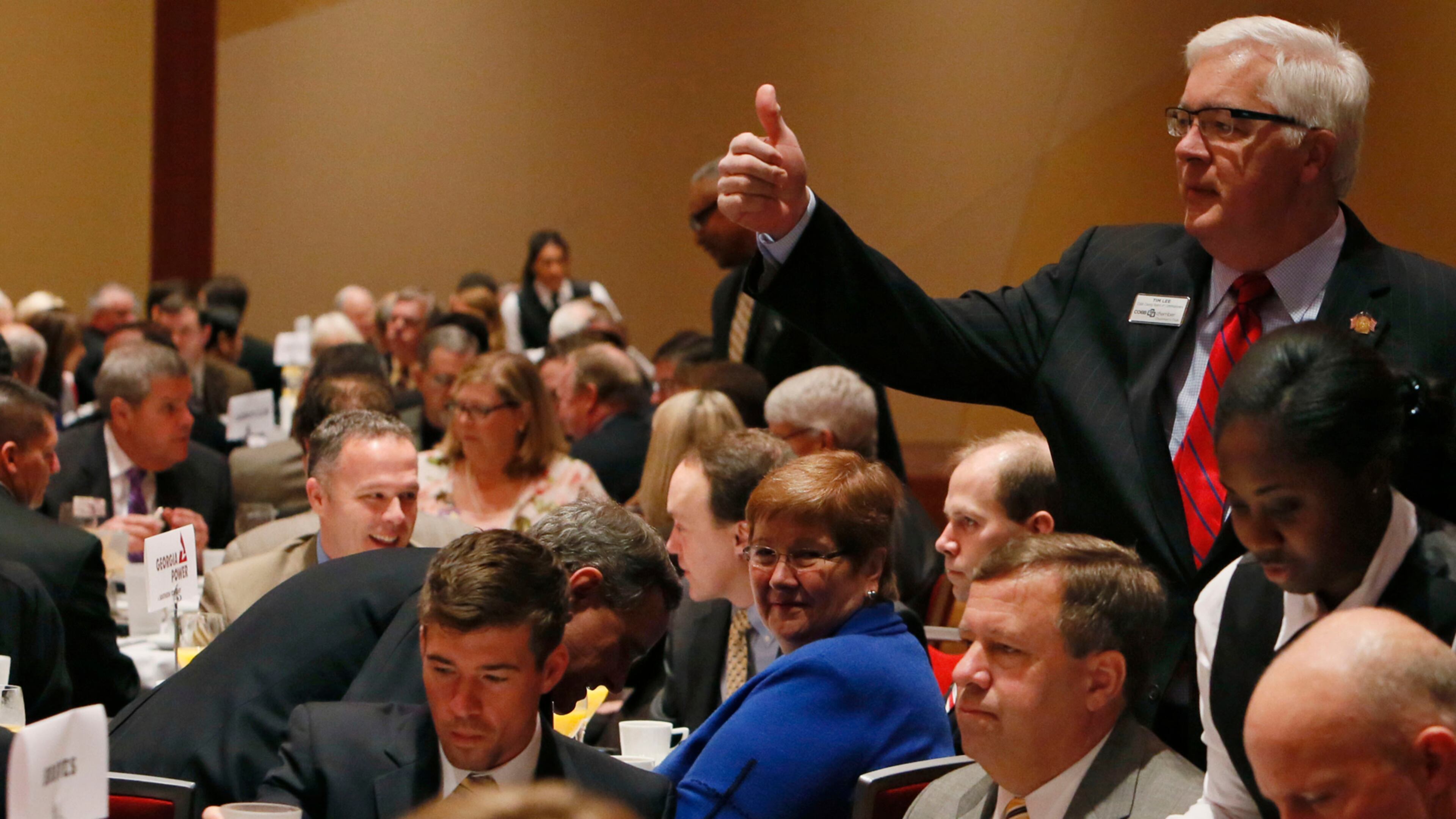 Cobb Commission Chairman Tim Lee (standing, far right) said in his Jan. 13 State of the County comments that Major League Baseball chose Cobb because the county “has been preparing for the Braves for 25 years.”