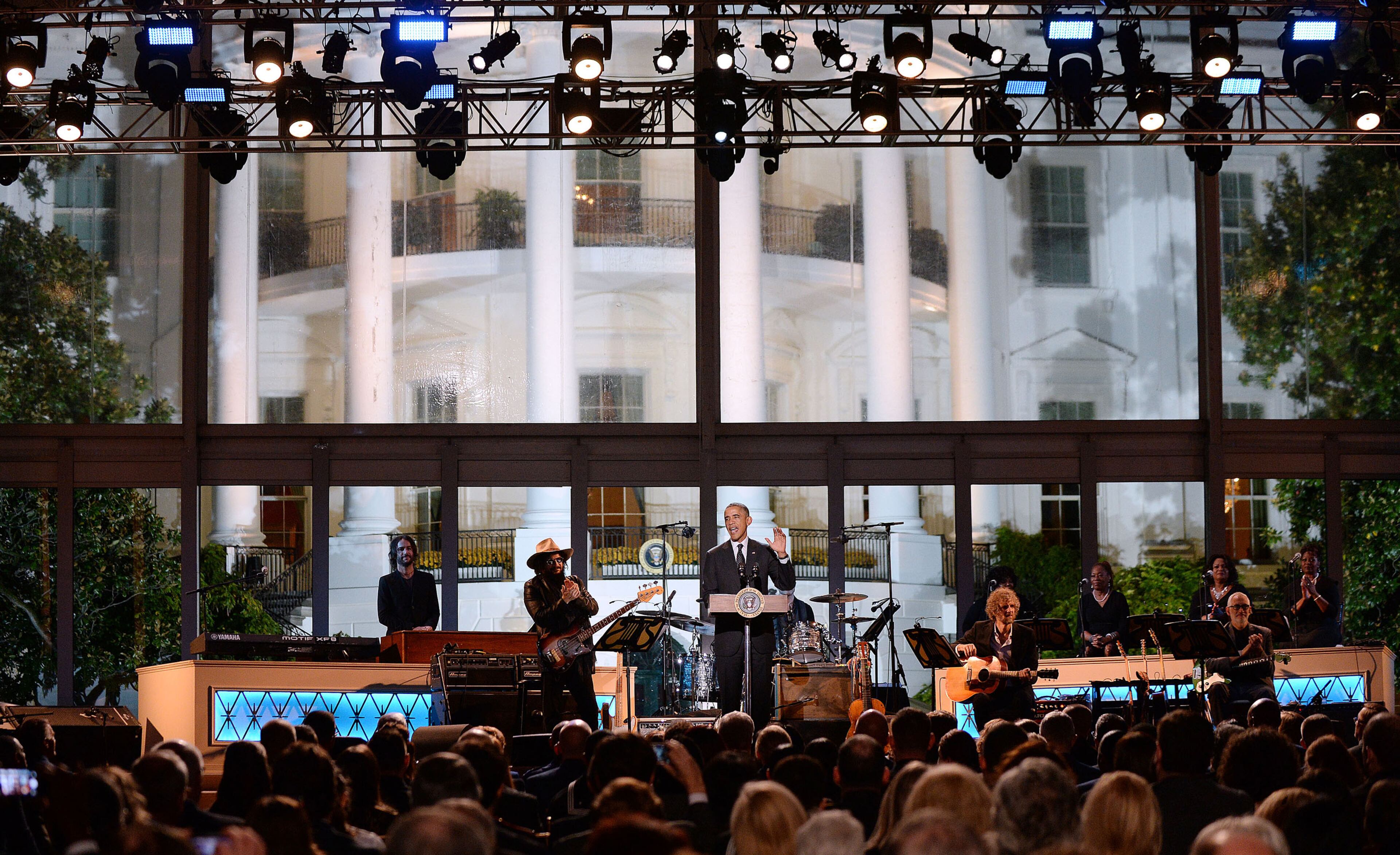 President Obama speaks at "A Salute to the Troops: In Performance at the White House" on the South Lawn on Thursday, Nov. 6, 2014, in Washington, D.C. The President and first lady invited music legends, members of the U.S. military, military veterans, and their families to the White House for a celebration of the men and women who serve the United States. (Olivier Douliery/Abaca Press/MCT)