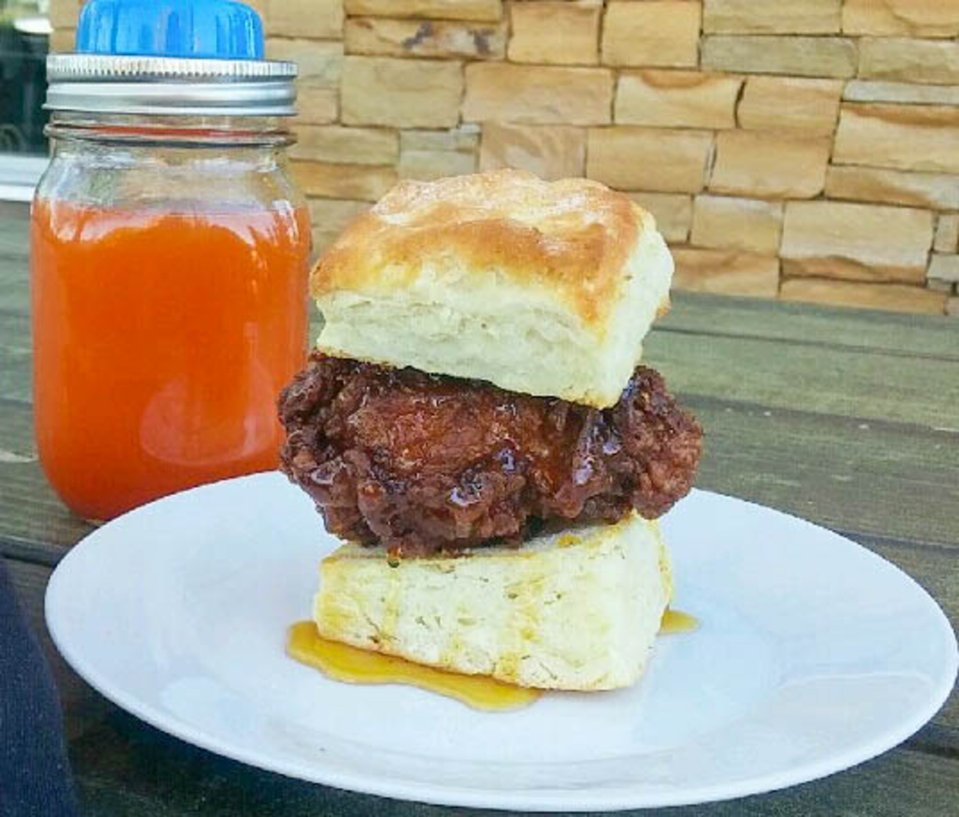 BEST FAMILY-FRIENDLY BRUNCH: Kid-pleasers at Ration and Dram include the fried chicken biscuit sandwich with juice such as Jack's Main Squeeze that comes in a glass with a spill-proof top. Read more here, plus check out three other family-friendly brunches. / Photo by Ration and Dram.