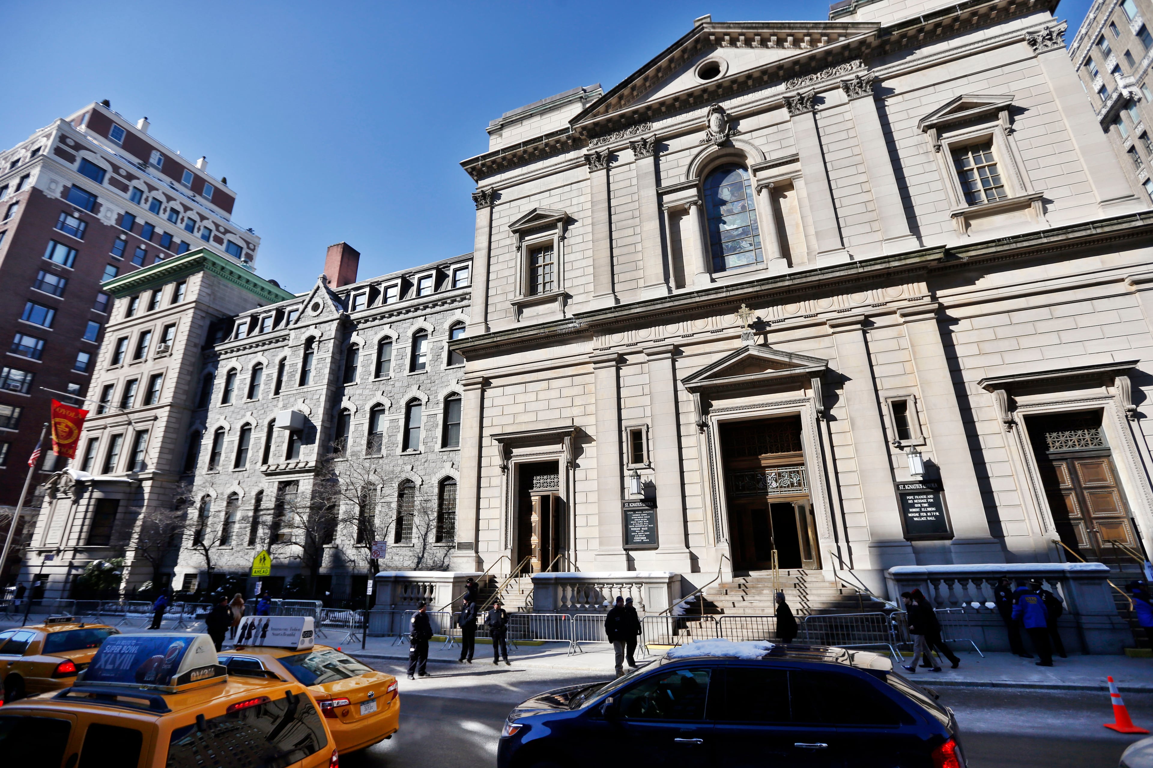 Barricades are placed outside of the Church of St. Ignatius Loyola before the funeral of actor Philip Seymour Hoffman Friday, Feb. 7, 2014, in New York. Hoffman, 46, was found dead Sunday of an apparent heroin overdose.