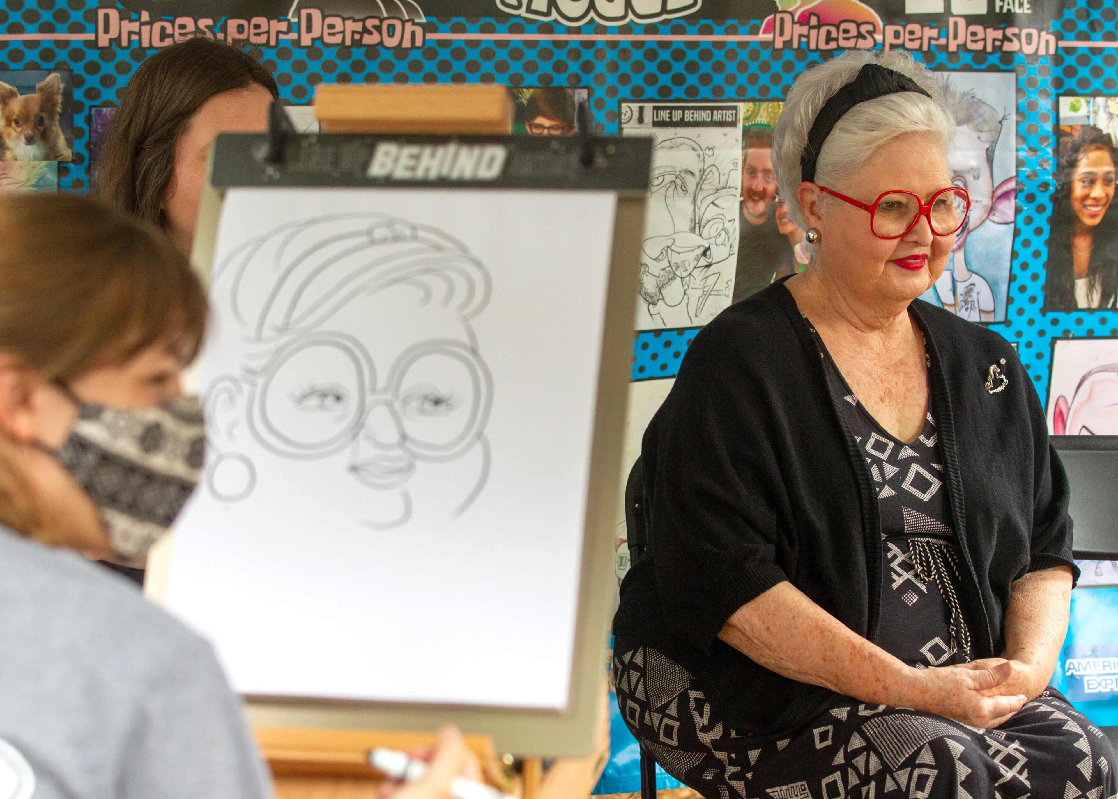 Penny Ball sits for her portrait during the Roswell Spring Arts and Crafts Festival on Sunday, June 13, 2021. (Photo: Steve Schaefer for The Atlanta Journal-Constitution)
