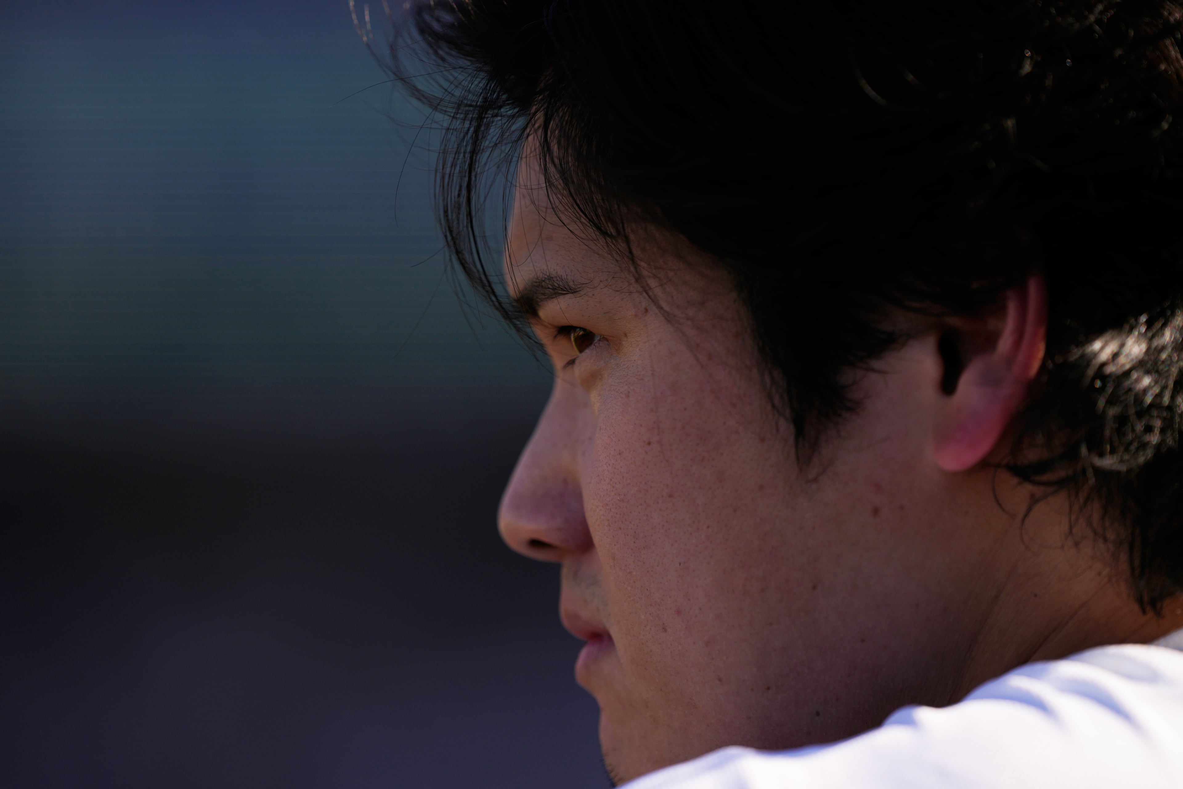 Los Angeles Dodgers' Shohei Ohtani looks on from the dugout during the eighth inning of Game 1 of a National League Division Series baseball game against the Atlanta Braves Saturday, Oct. 3, 2026, in Los Angeles. (Mark J. Terrill/AP)