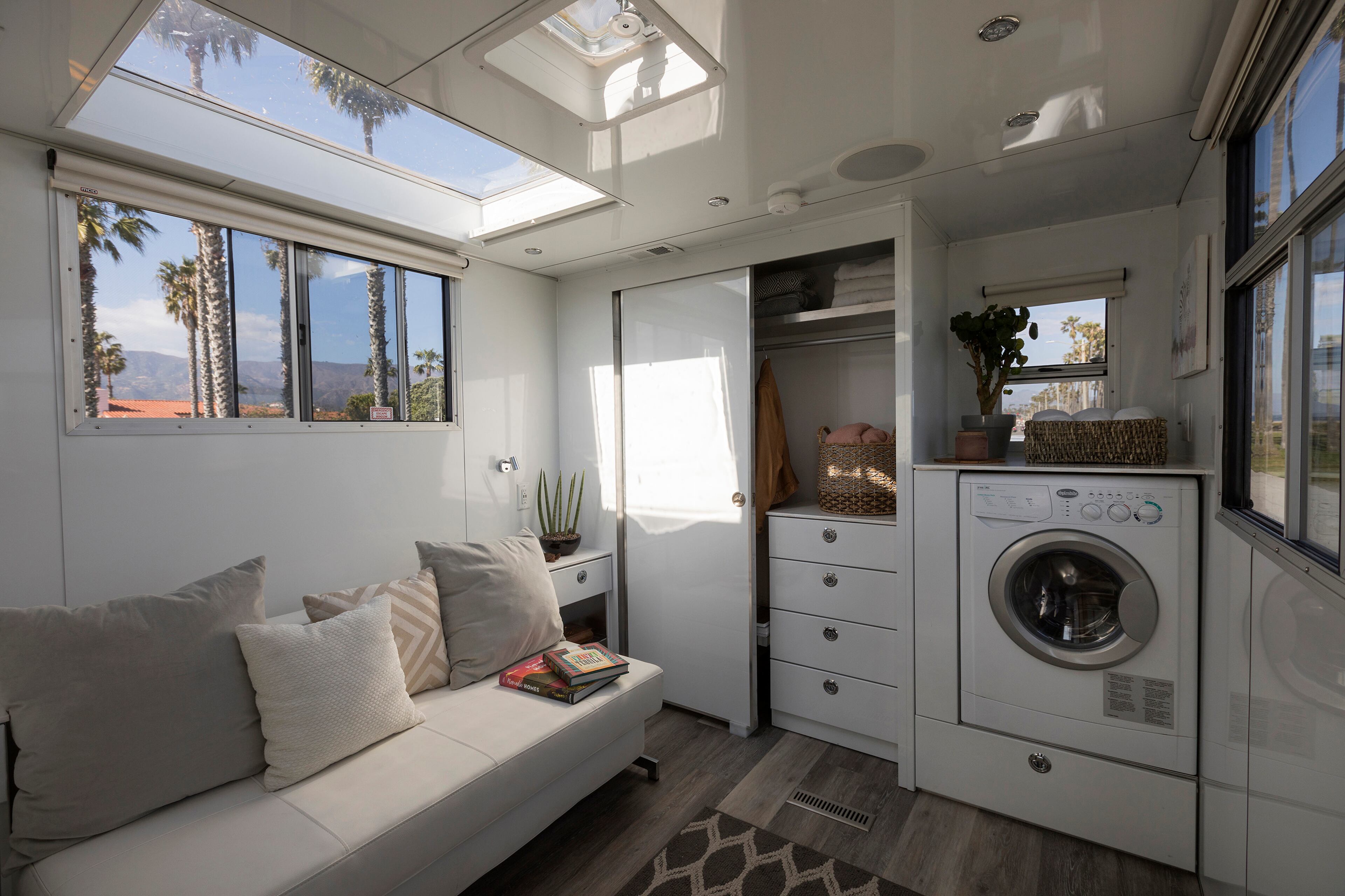 The washing machine and pull out bed in the Living Vehicle, at Cabrillo beach. (Ricardo DeAratanha/Los Angeles Times/TNS)