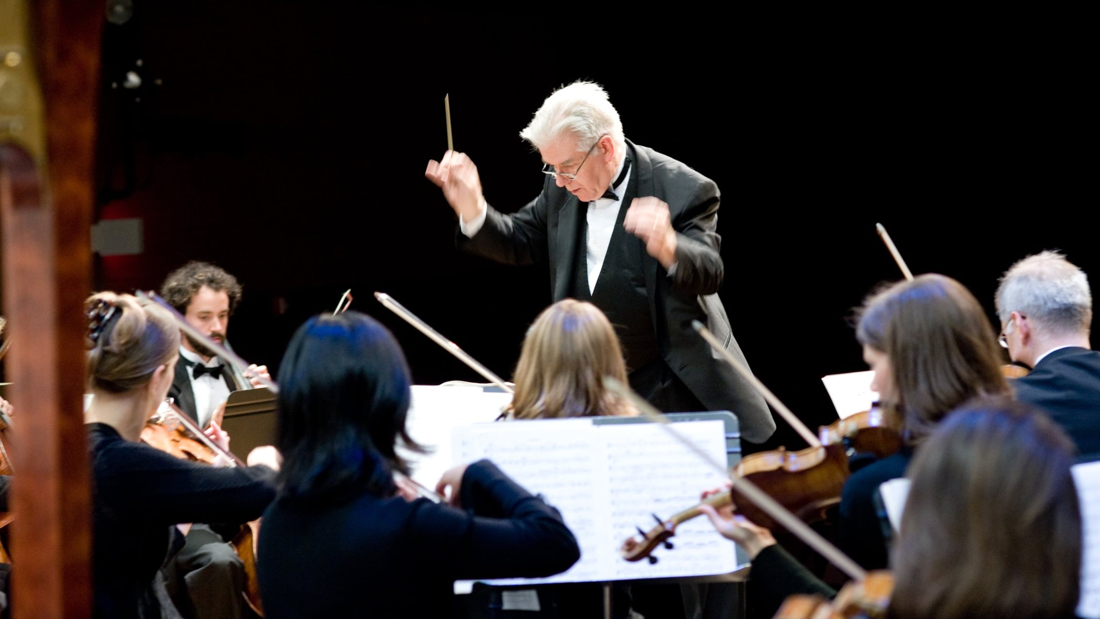 J. Wayne Baughman conducts the Johns Creek Symphony, a professional orchestra that makes its home in the Northside community.