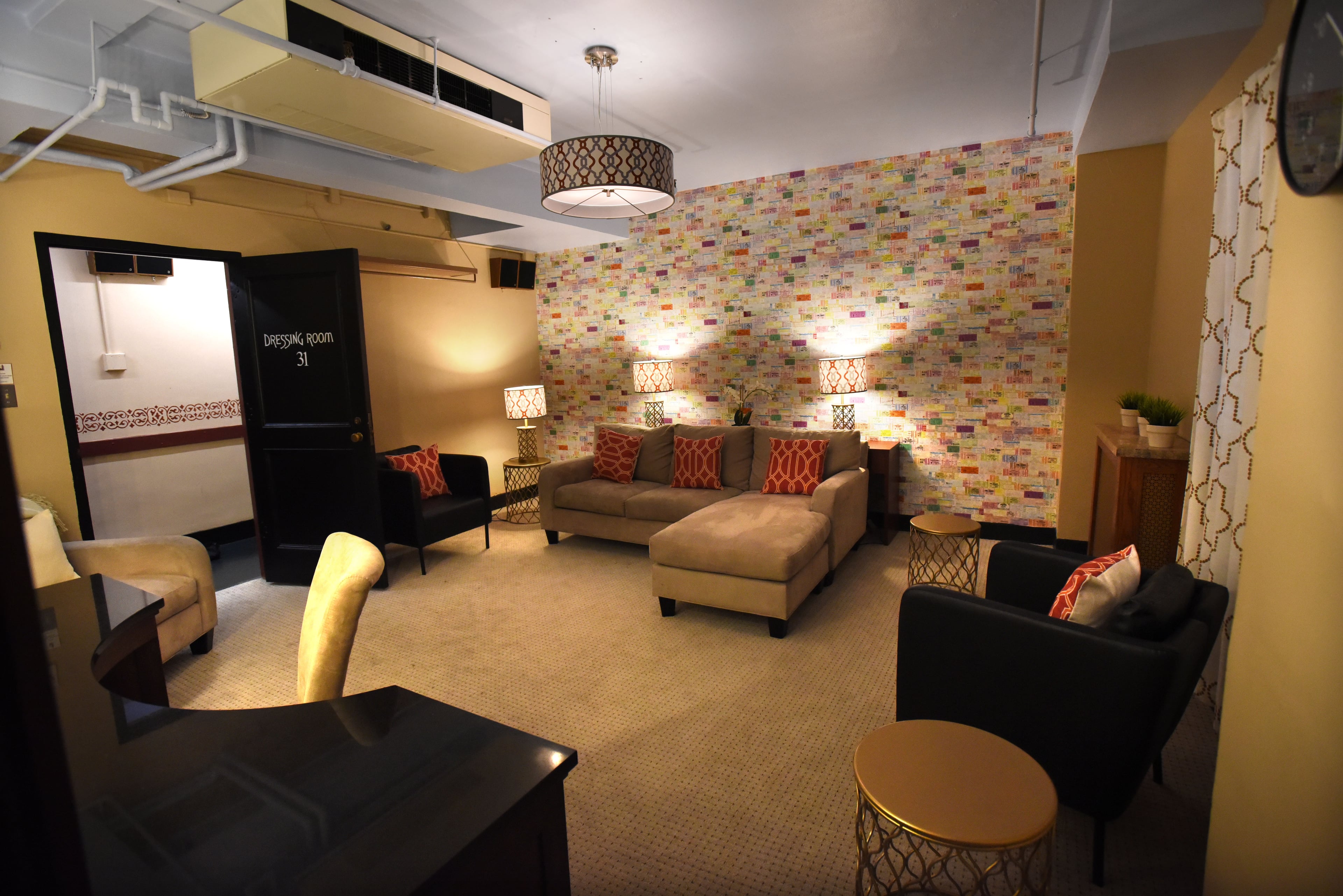 Ticket stubs from more than 40 years of shows at the Fox Theatre in Atlanta adorn a wall of a dressing room in the theater. HYOSUB SHIN / HSHIN@AJC.COM