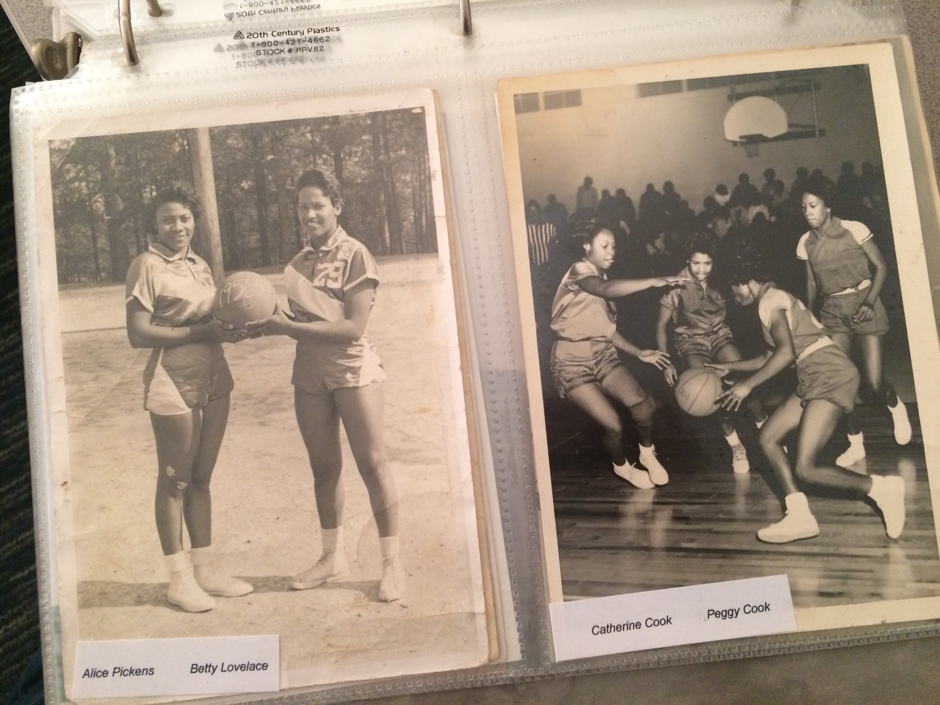 Charles Grogan keeps a collection of photos from the old Bailey-Johnson School, many of which were used in the production of the school’s “Blue Clover” yearbooks. Although the school was small— around 150 students from 1st through 12th grades—Bailey-Johnson managed to field teams in basketball and track & field. (PETE CORSON / pcorson@ajc.com)