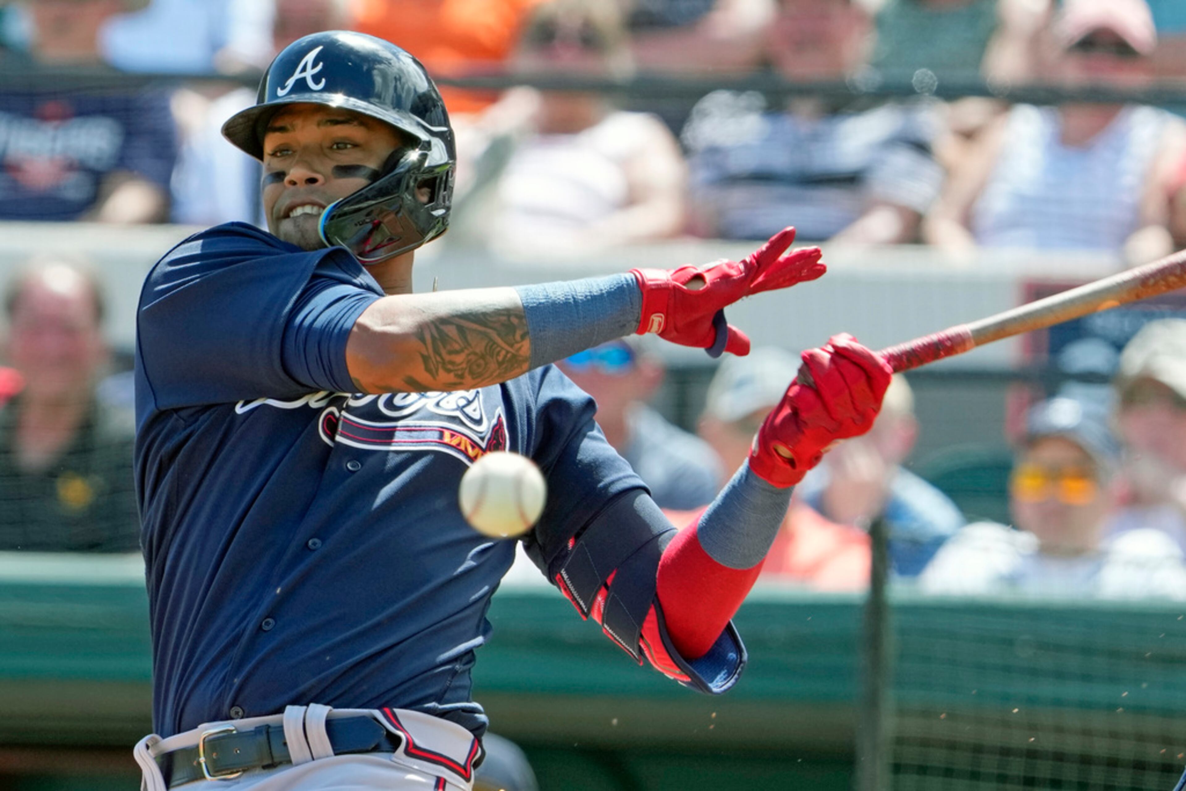 Atlanta Braves' Orlando Arcia fouls a pitch in the first inning of a spring training baseball game against the Detroit Tigers, Wednesday, March 22, 2023, in Lakeland, Fla. (AP Photo/John Raoux)