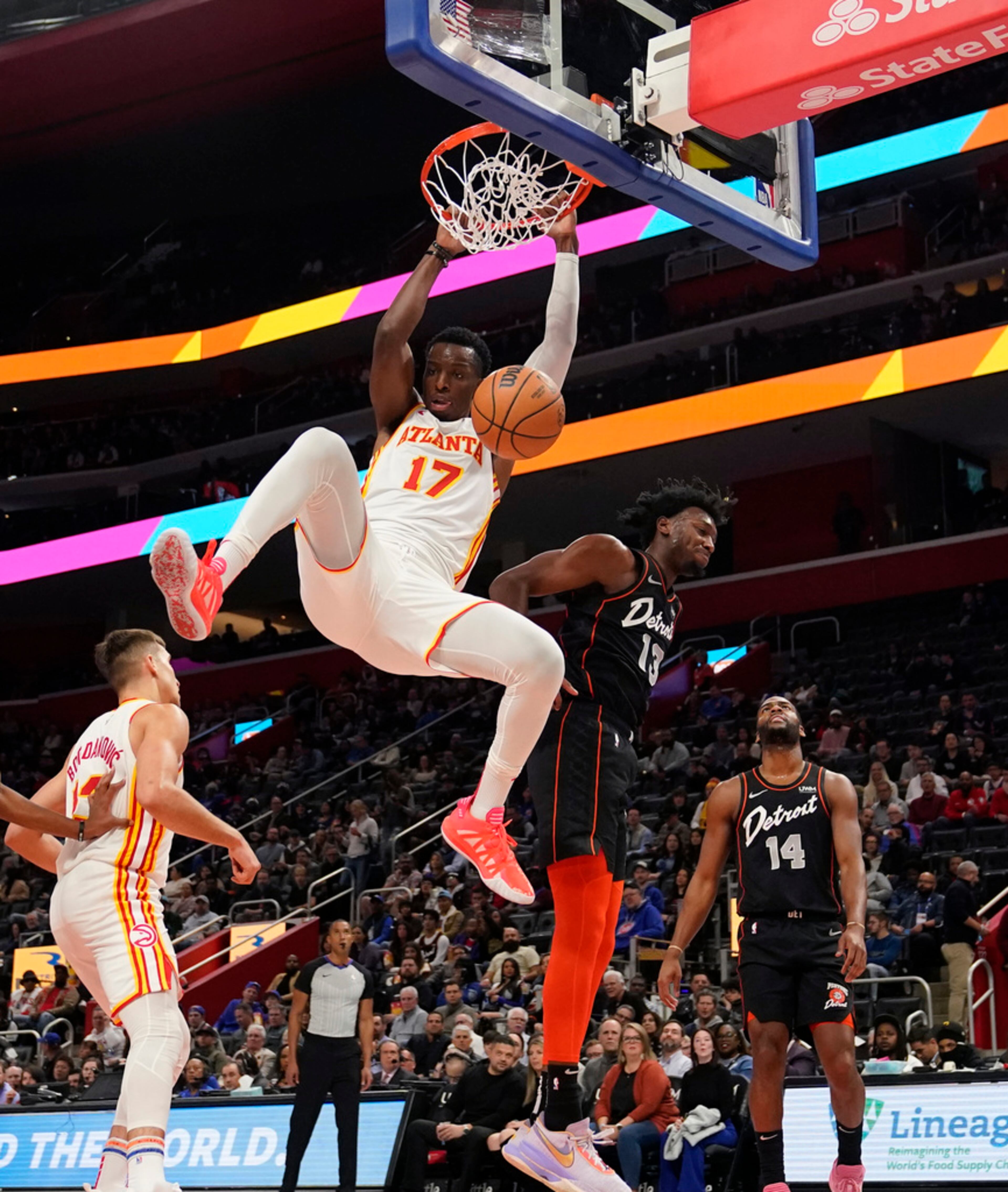 Atlanta Hawks forward Onyeka Okongwu (17) dunks during the first half of an NBA basketball game against the Detroit Pistons, Tuesday, Nov. 14, 2023, in Detroit. (AP Photo/Carlos Osorio)