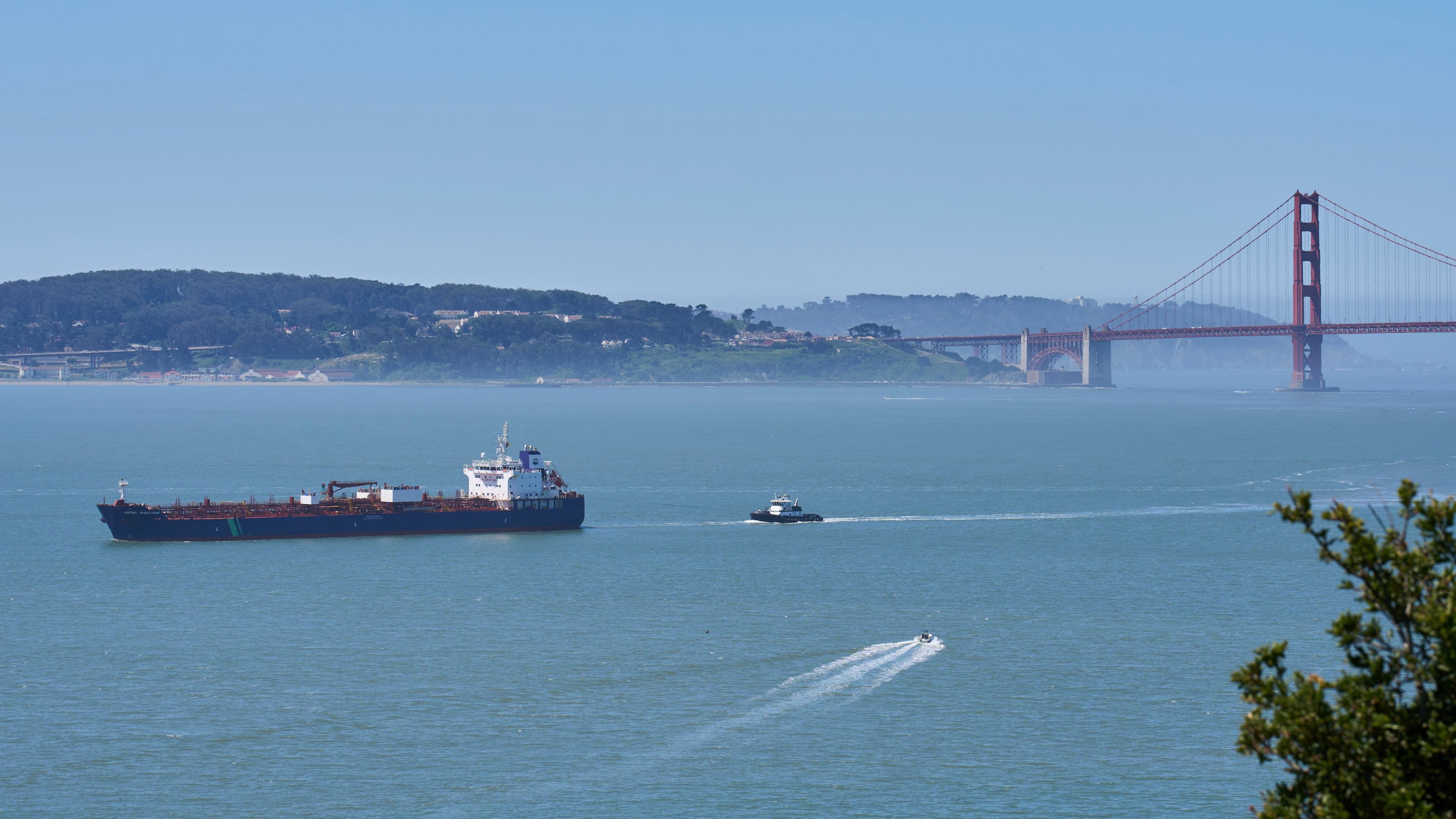 A tanker and other vessels pass through the San Francisco Bay, Tuesday, May 19, 2026. (AP Photo/Annika Hammerschlag)
