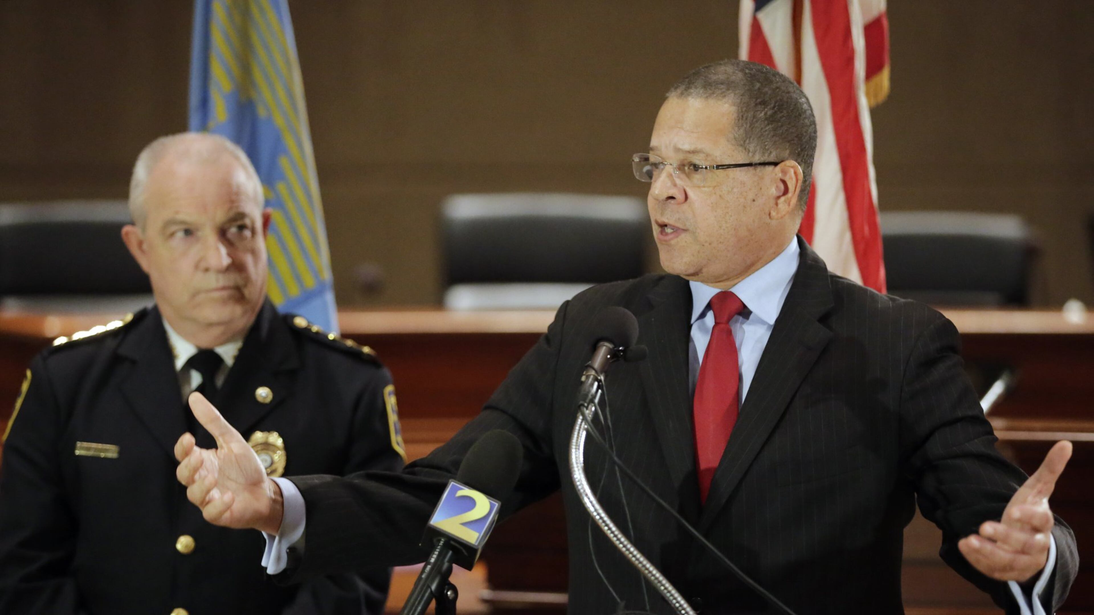 Fulton County Commission Chairman John Eaves (right), standing beside Fulton county police chief Gary Stiles at a press conference, announced proposals to help reduce crime in south Fulton, where there has been an increase this year in car thefts and items stolen from cars. The ideas include a multi-jurisdictional police team to patrol gas stations and grants for increasing surveillance. BOB ANDRES /BANDRES@AJC.COM