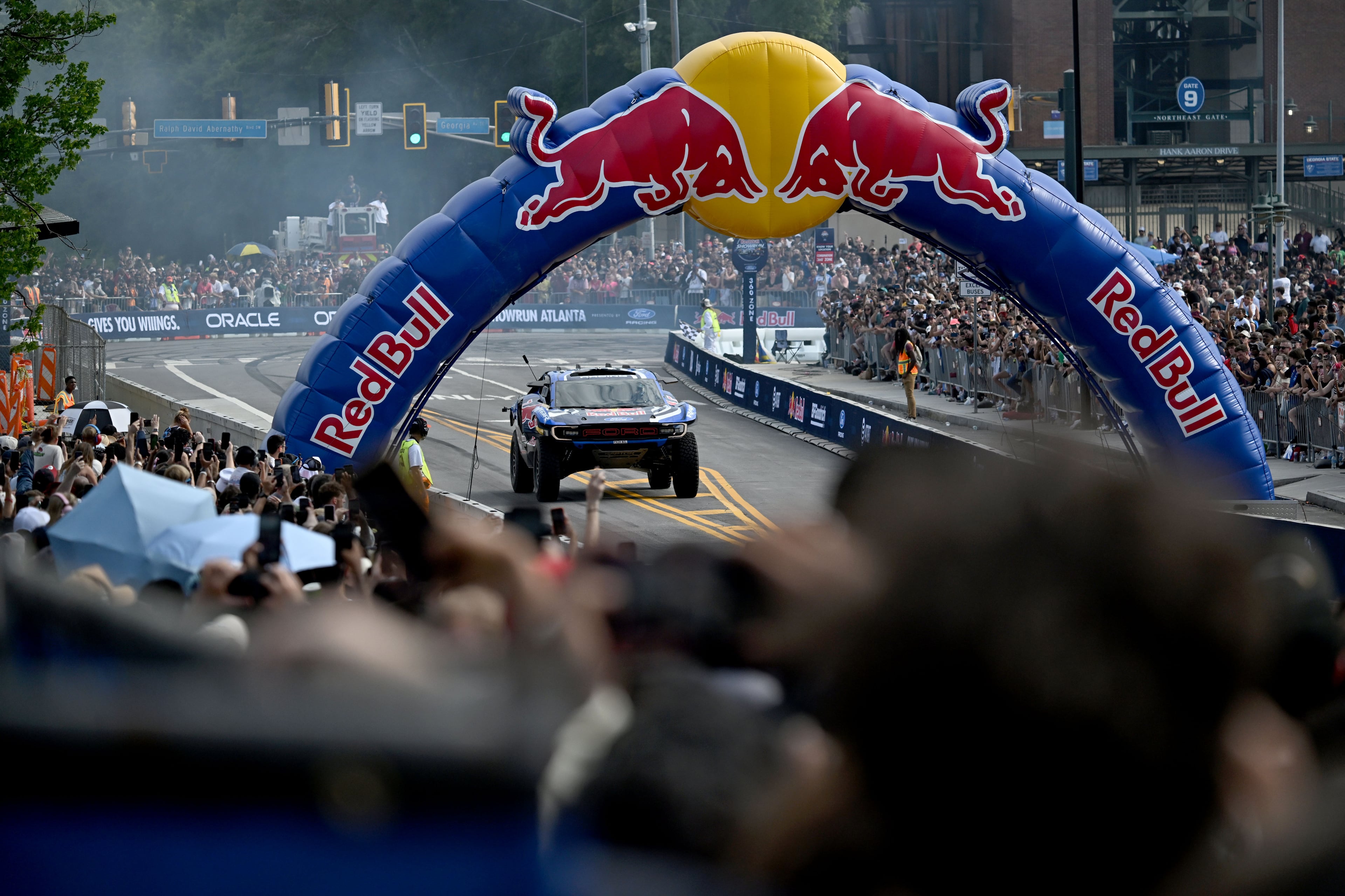 A Ford Performance vehicle takes part in a demonstration run on Hank Aaron Drive during the Red Bull Showrun Atlanta Presented by Ford Racing on Saturday, Aug. 1, 2026, in Atlanta. Atlanta city officials this week approved permits for the Red Bull Showrun that will allow the live motorsports demonstration event to go on as advertised along a roughly half-mile stretch of Hank Aaron Drive — a backup location after earlier plans to hold the event near Piedmont Park ran into opposition from Midtown residents. (Hyosub Shin/AJC)
