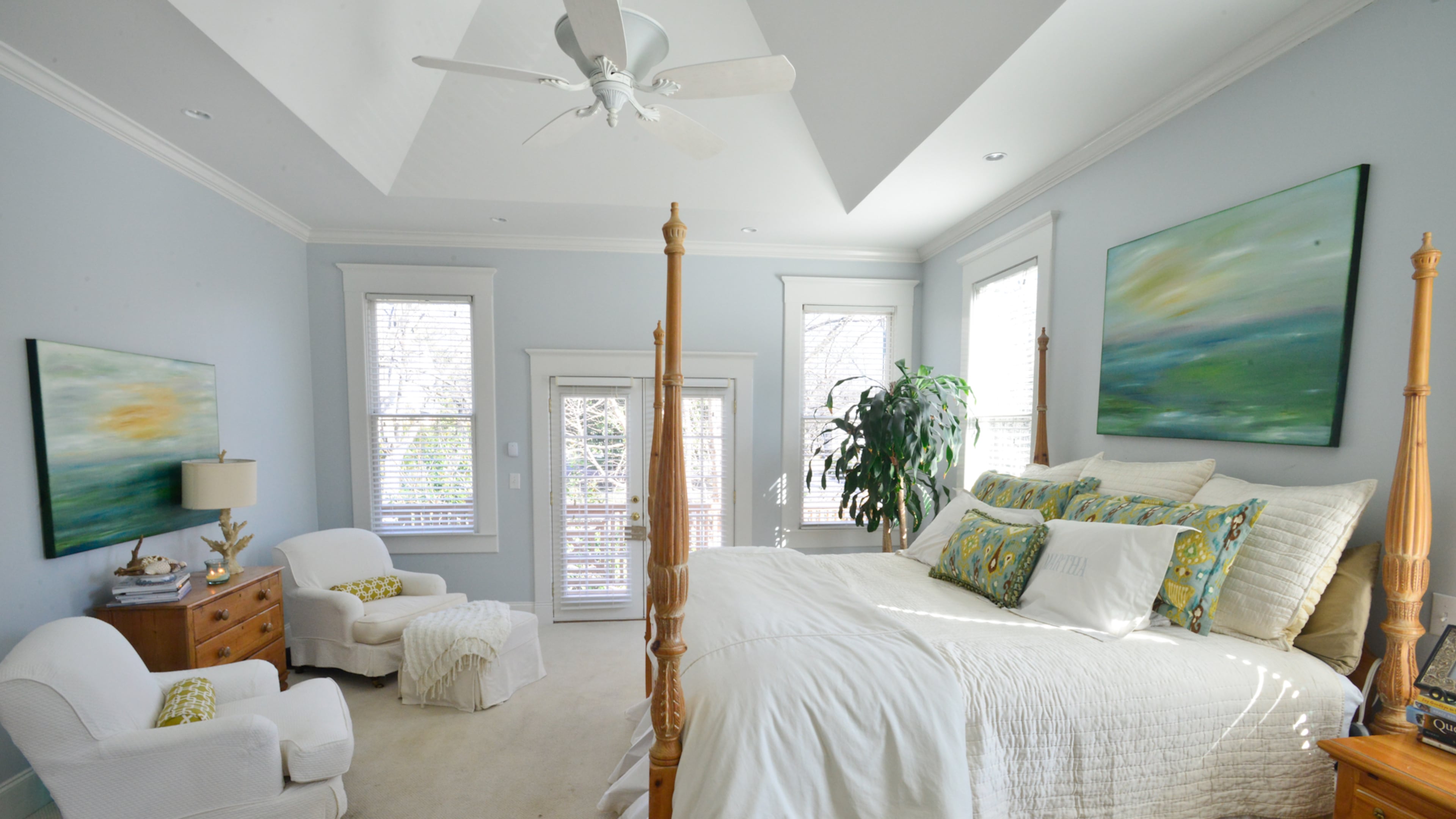 The pine rice-carved bed in the master bedroom was a gift Ann Roland purchased for herself after graduating from Texas Christian University.