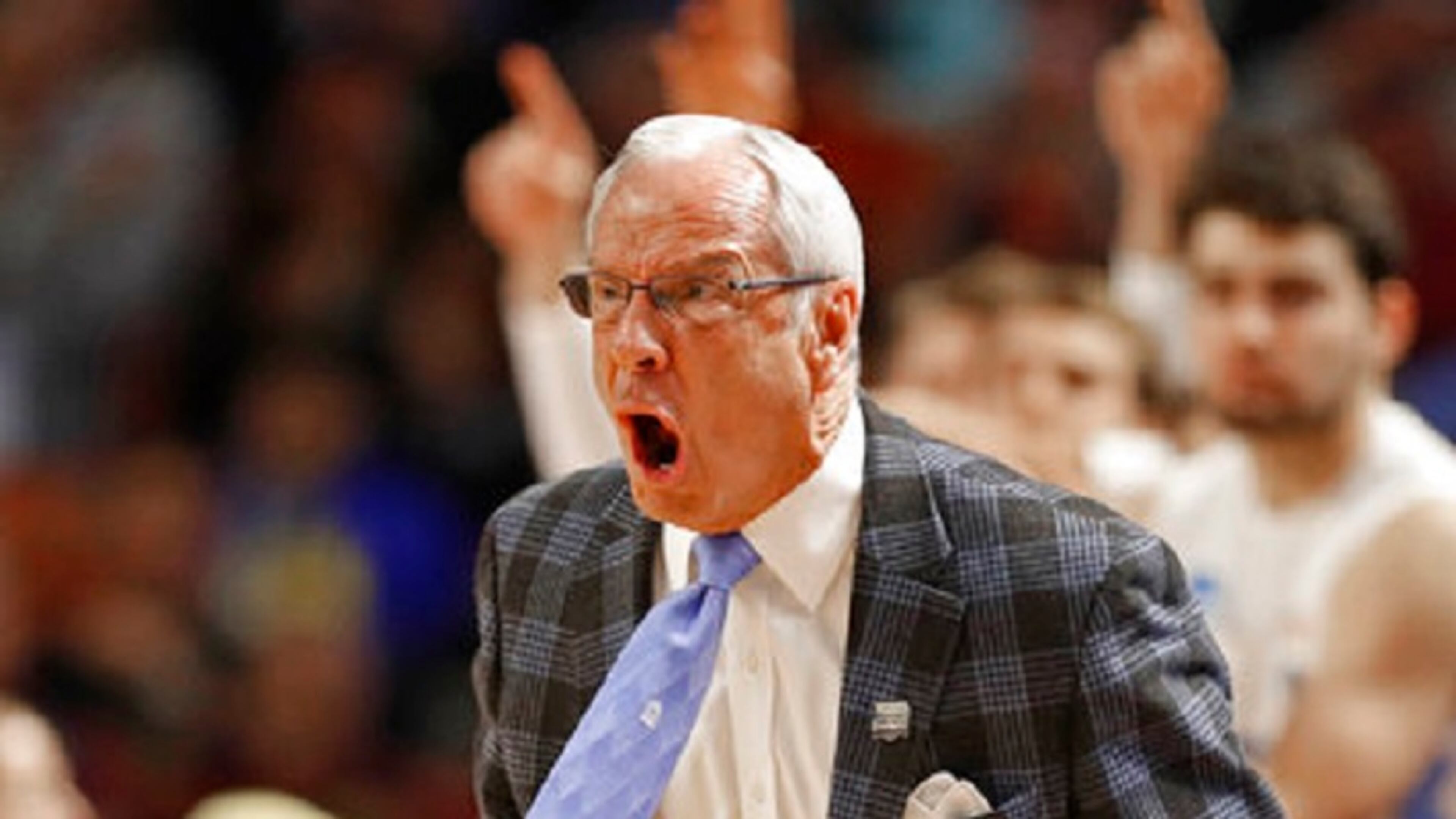 North Carolina head coach Roy Williams shouts at his team during the first half in a second-round game against Arkansas of the NCAA men's college basketball tournament in Greenville, S.C., Sunday, March 19, 2017. (AP Photo/Chuck Burton)