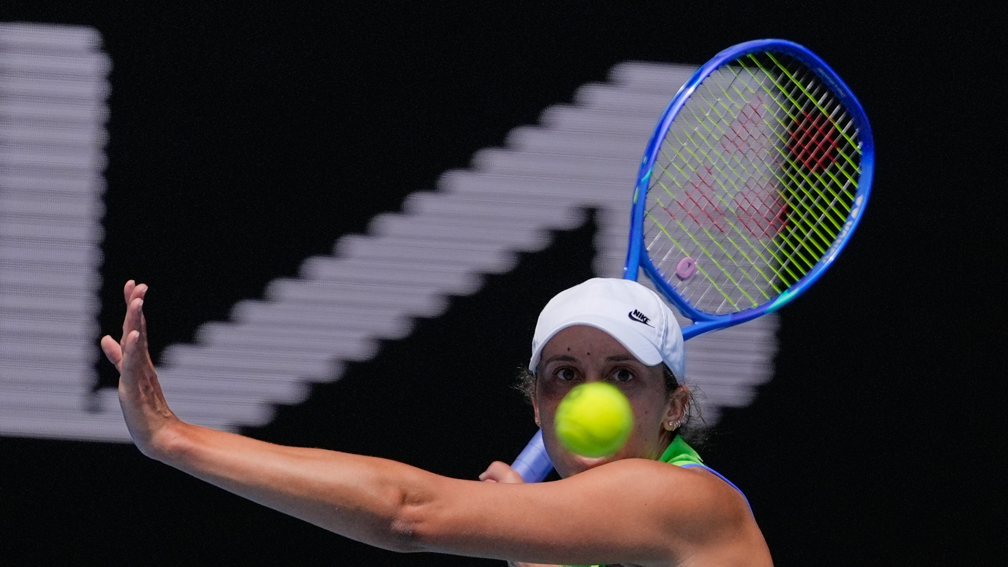 Madison Keys of the U.S. plays a forehand return to compatriot Ashlyn Krueger during their second round match at the Australian Open tennis championship in Melbourne, Australia, Thursday, Jan. 22, 2026. (AP Photo/Asanka Brendon Ratnayake)