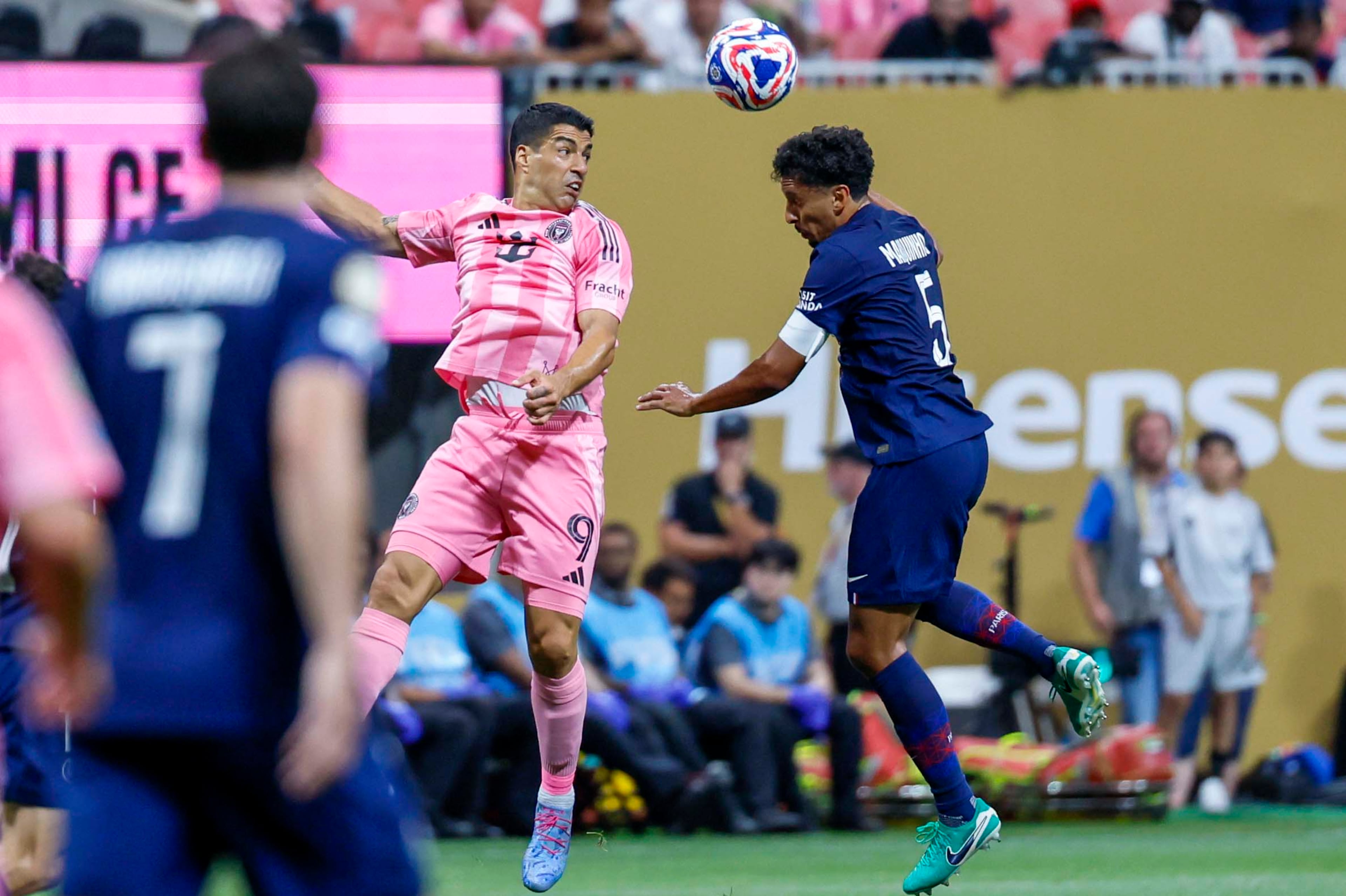 Inter Miami forward Luis Suárez (9) disputes the ball against Paris Saint-Germain defender Marquinhos (5) during the Club World Cup round of 16 soccer match between Paris Saint-Germain FC and Inter Miami in Atlanta, Georgia, on Sunday, June 29, 2025.
(Miguel Martinez/ AJC)