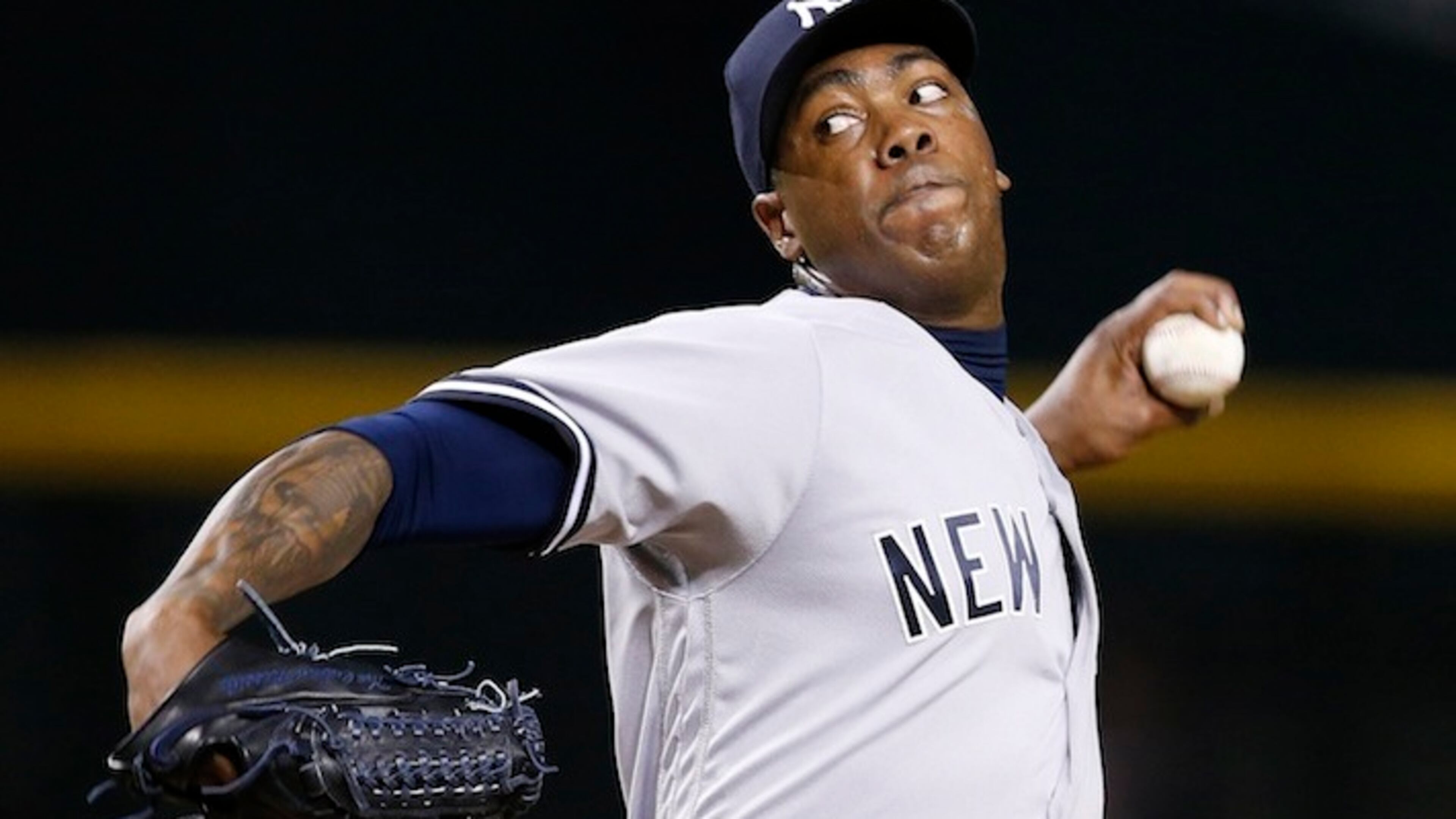 In this May 18, 2016, file photo, New York Yankees' Aroldis Chapman throws a pitch against the Arizona Diamondbacks during the ninth inning of a baseball game, in Phoenix. The Chicago Cubs acquired hard-throwing reliever Chapman in a trade with the Yankees on Monday, July 25. (AP Photo/Ross D. Franklin, File)