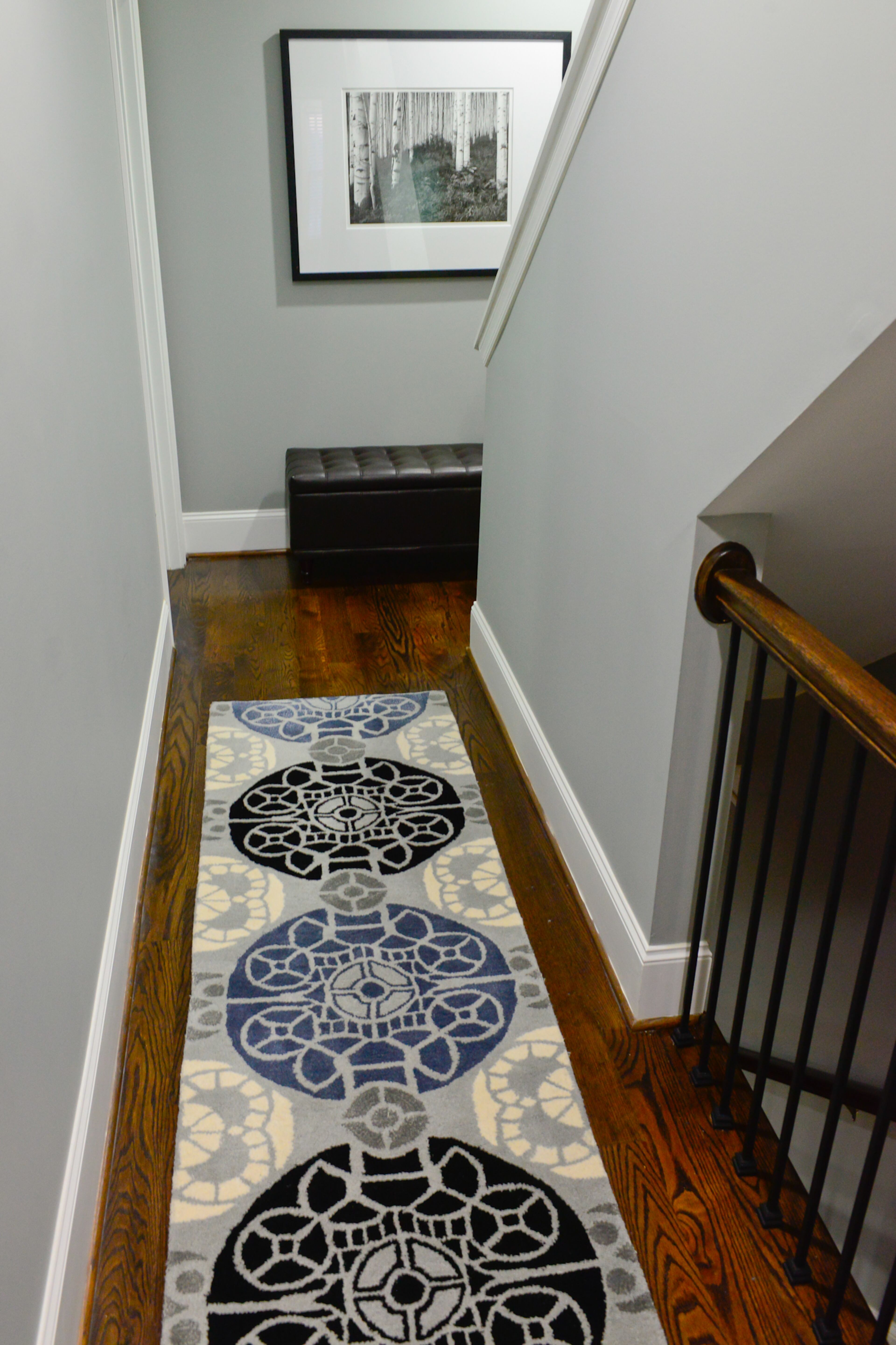 The townhome, which has dark hardwood floors, were decorated with help from Larry Brown's sister, Gloria Williams. The 2,583-square-foot townhome has three bedrooms, one flex room used as an office, three full and two half baths. The rug was purchased from Overstock.com.(Christopher Michael Oquendo/www.ophotography.com)